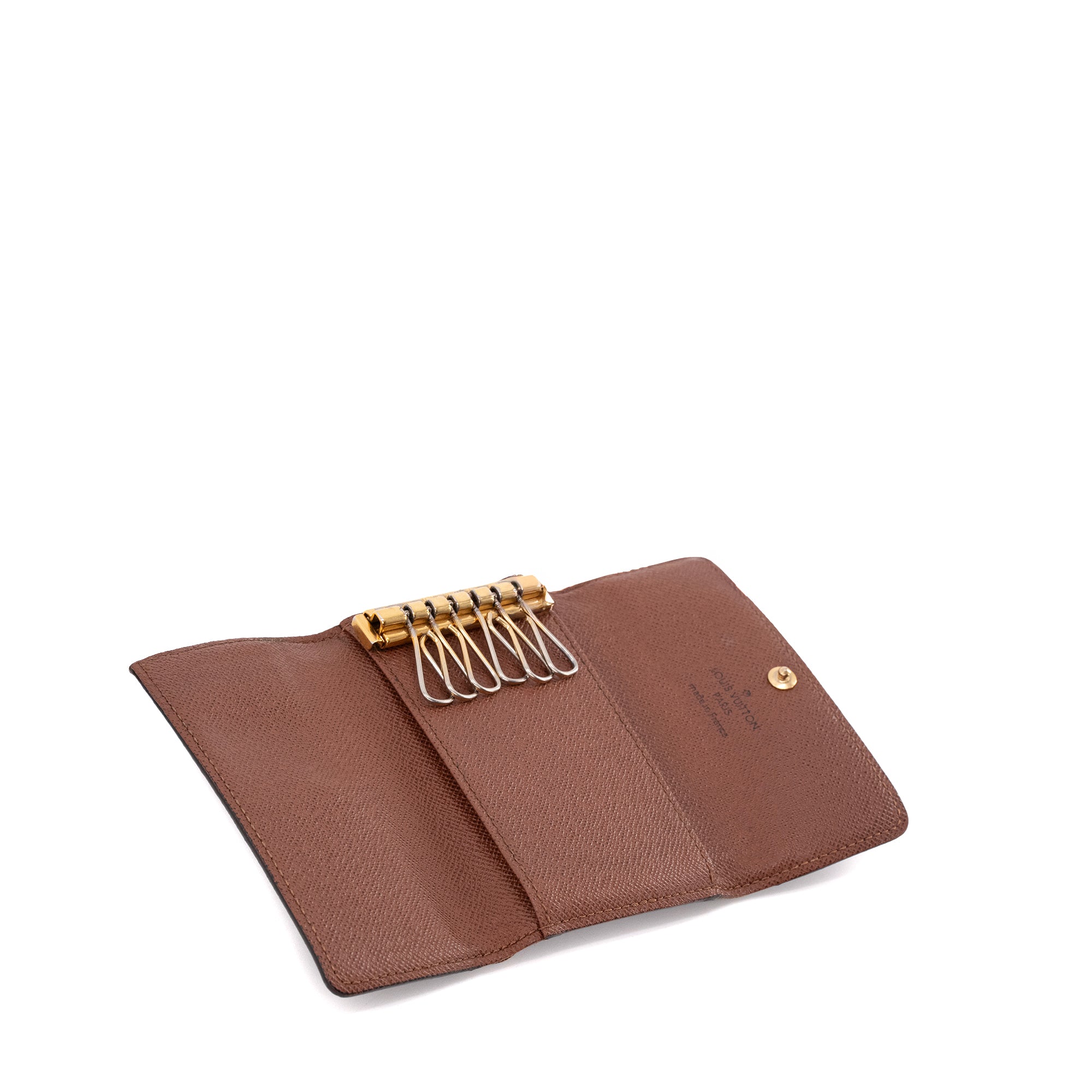 LOUIS VUITTON - Pochette Multiclés Louis Vuitton en toile enduite monogrammée