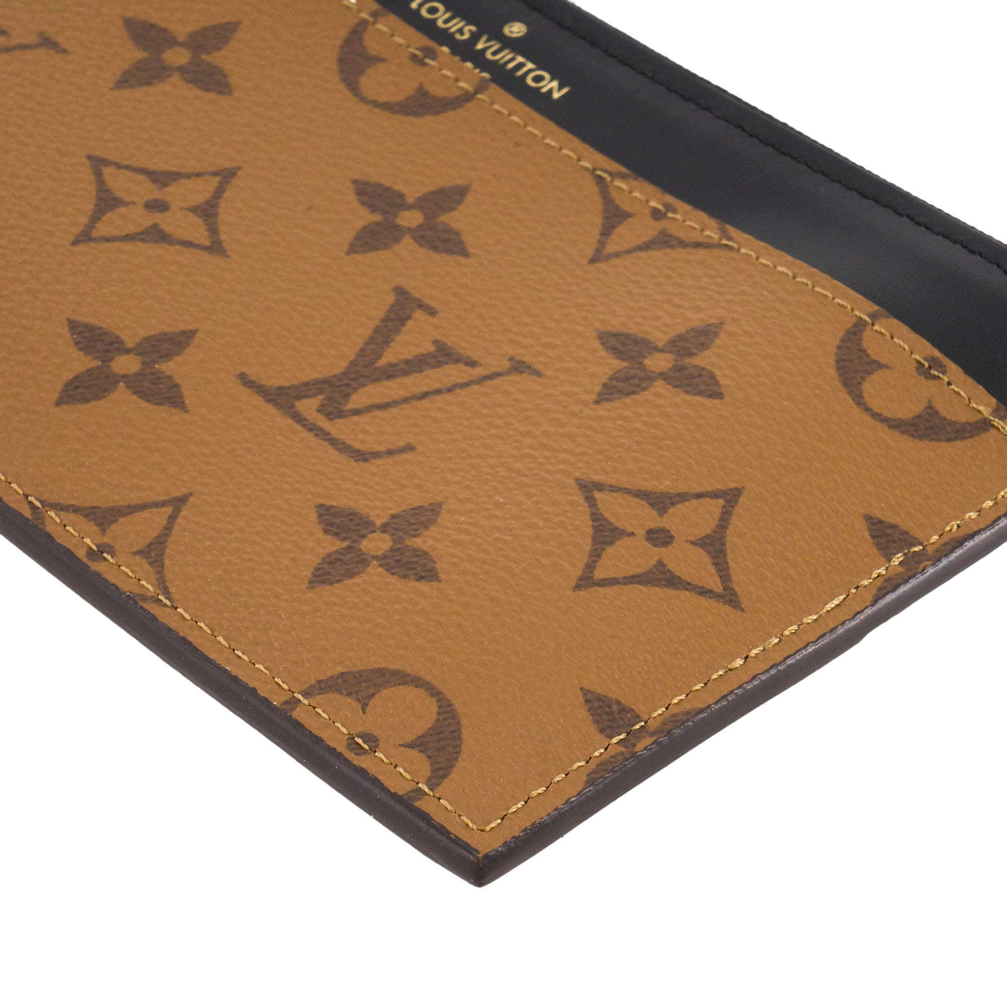 LOUIS VUITTON - Porte-monnaie Slim Louis Vuitton en toile enduite monogrammée reverse