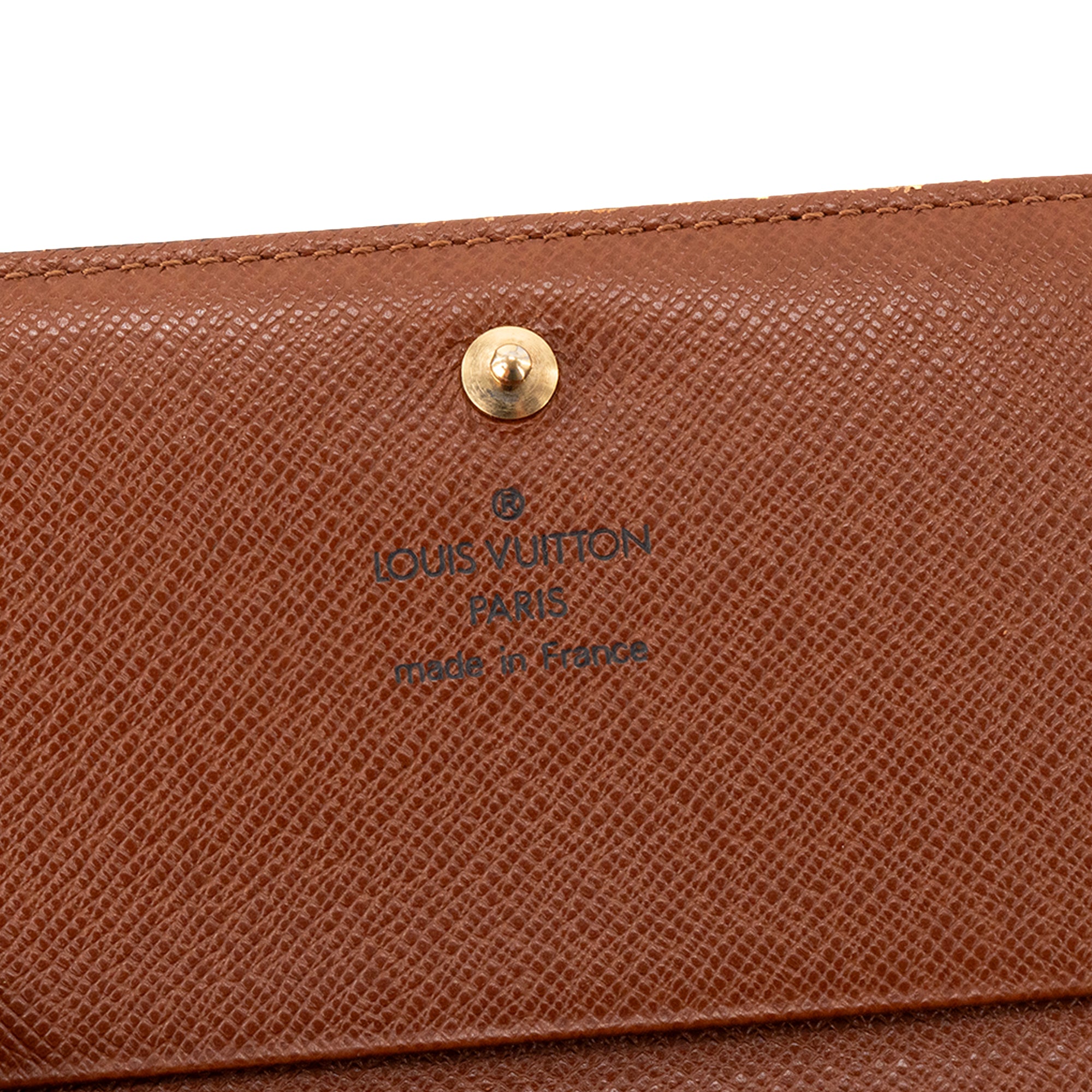 LOUIS VUITTON - Porte-monnaie Trésor Louis Vuitton en toile enduite monogrammée vintage