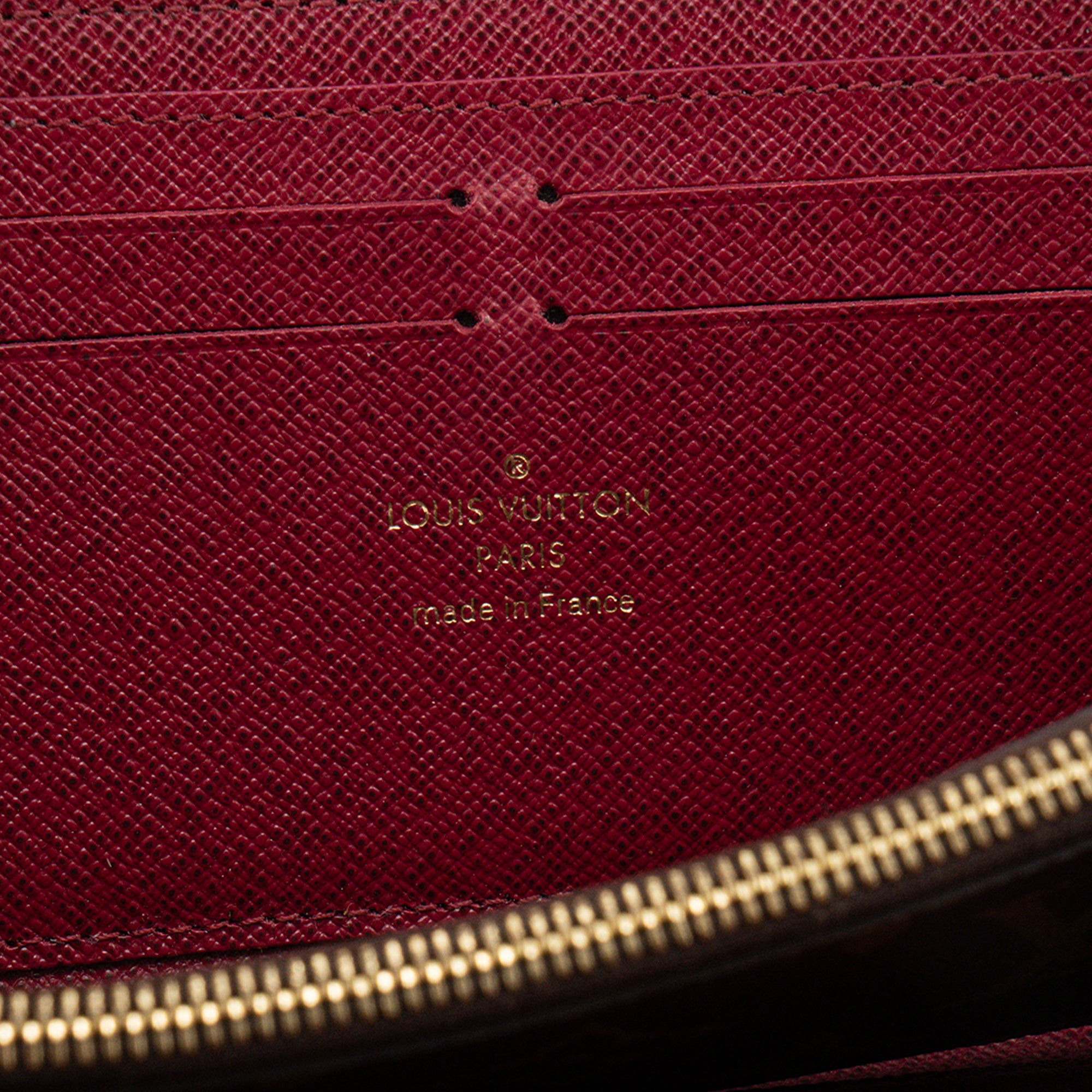 LOUIS VUITTON - Portefeuille Clémence Louis Vuitton en toile enduite monogrammée