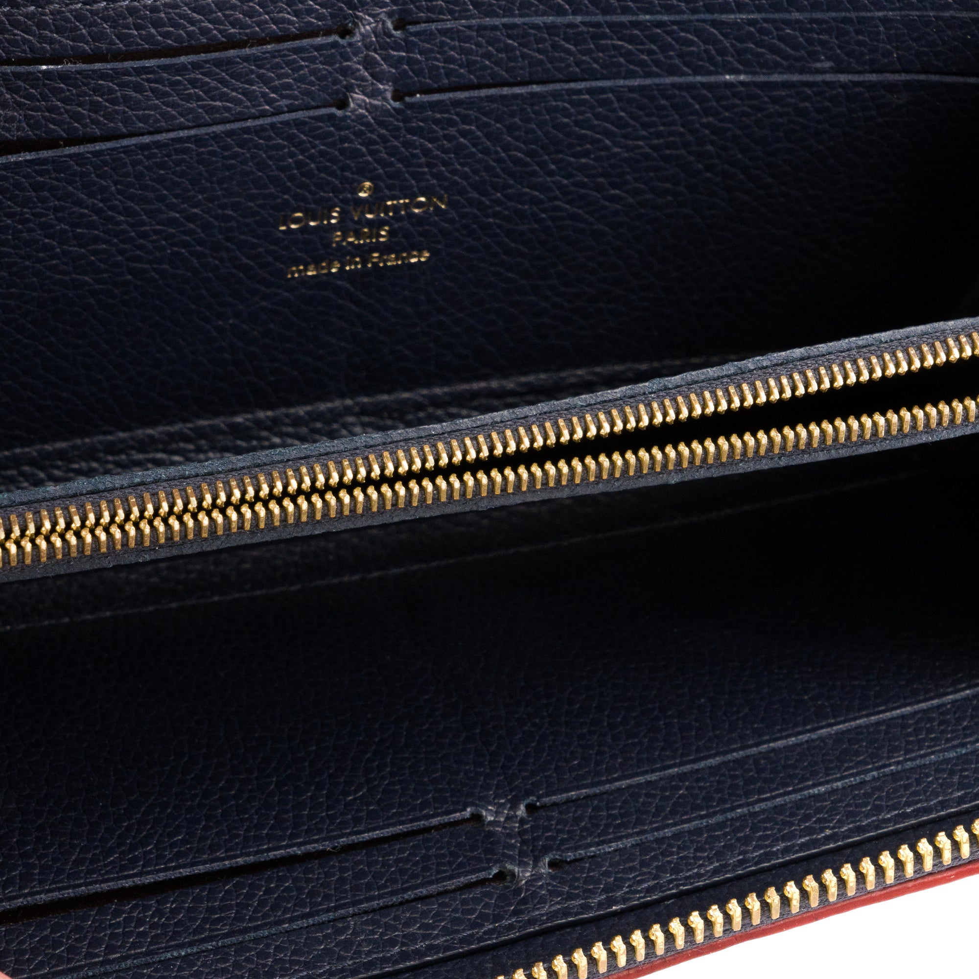 LOUIS VUITTON - Portefeuille Clémence Louis Vuitton en cuir empreinte bleu marine