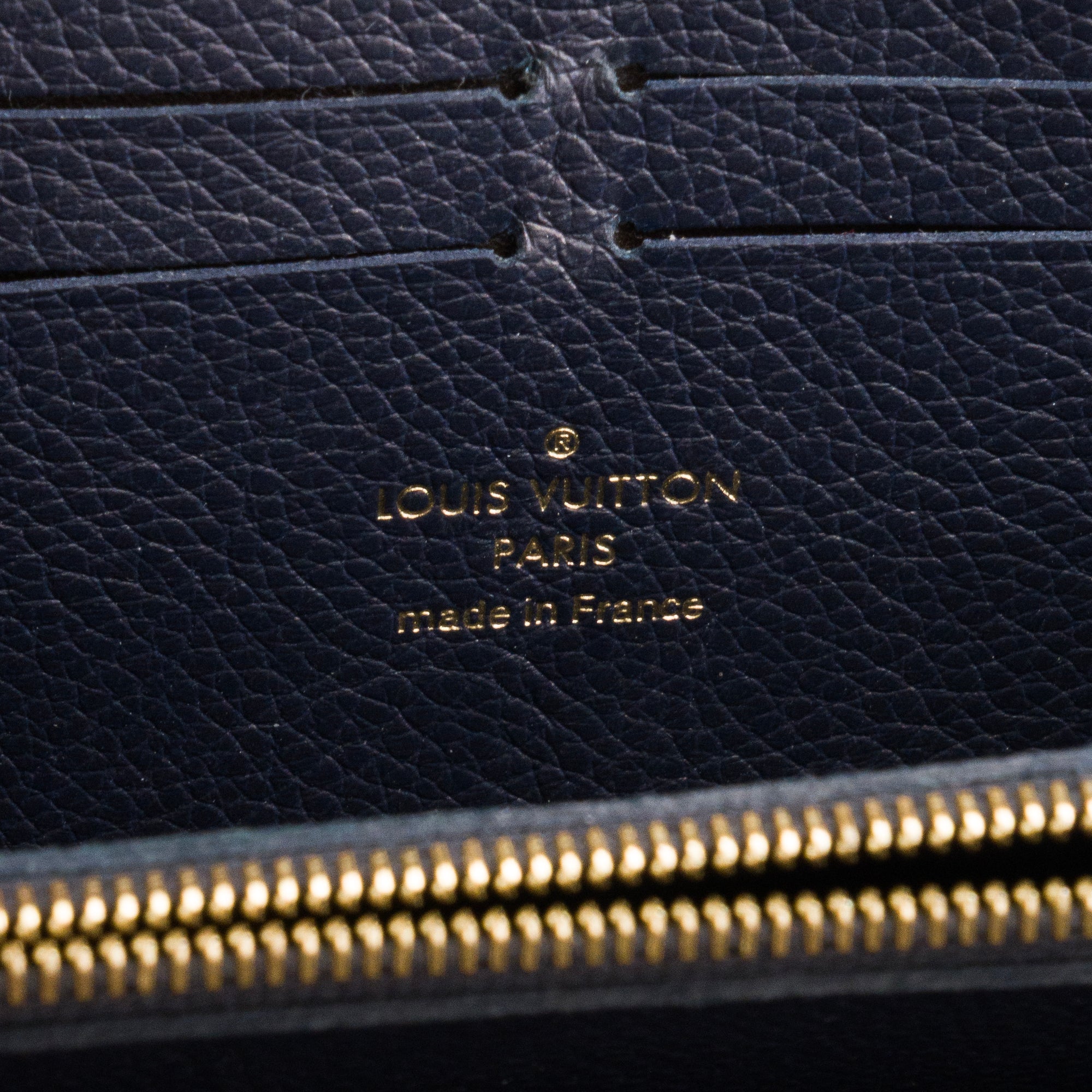LOUIS VUITTON - Portefeuille Clémence Louis Vuitton en cuir empreinte bleu marine