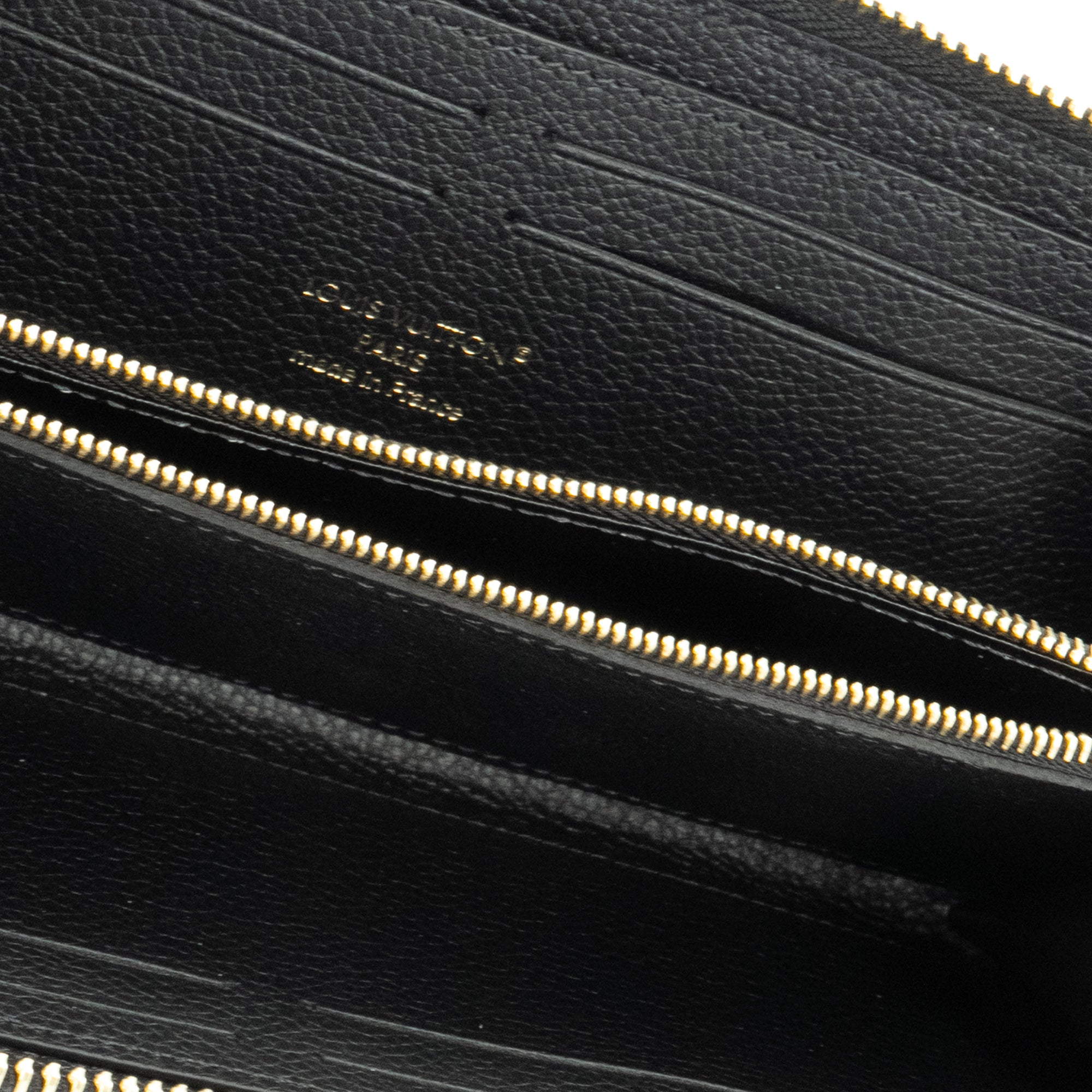 LOUIS VUITTON - Portefeuille Clémence Louis Vuitton en cuir empreinte monogram noir