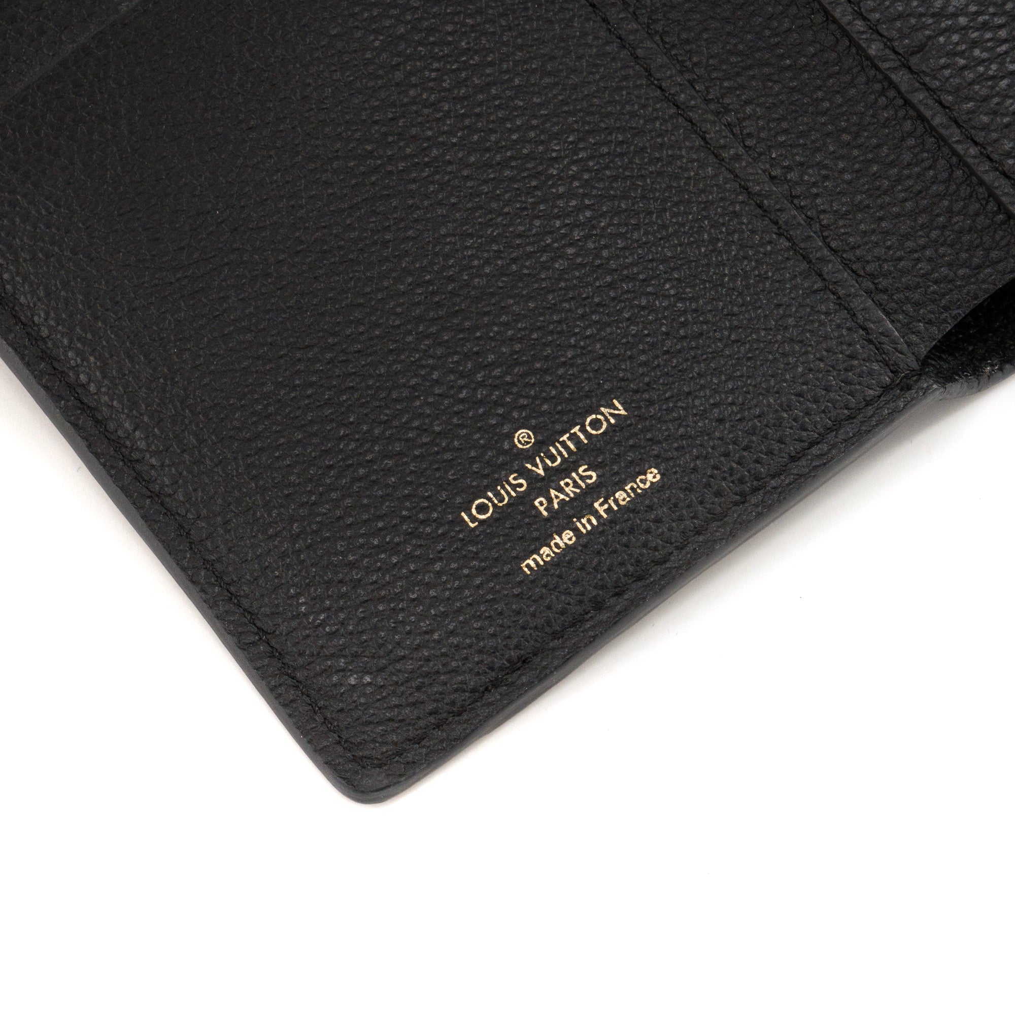 LOUIS VUITTON - Portefeuille Curieuse compact Louis Vuitton en cuir empreinte noir