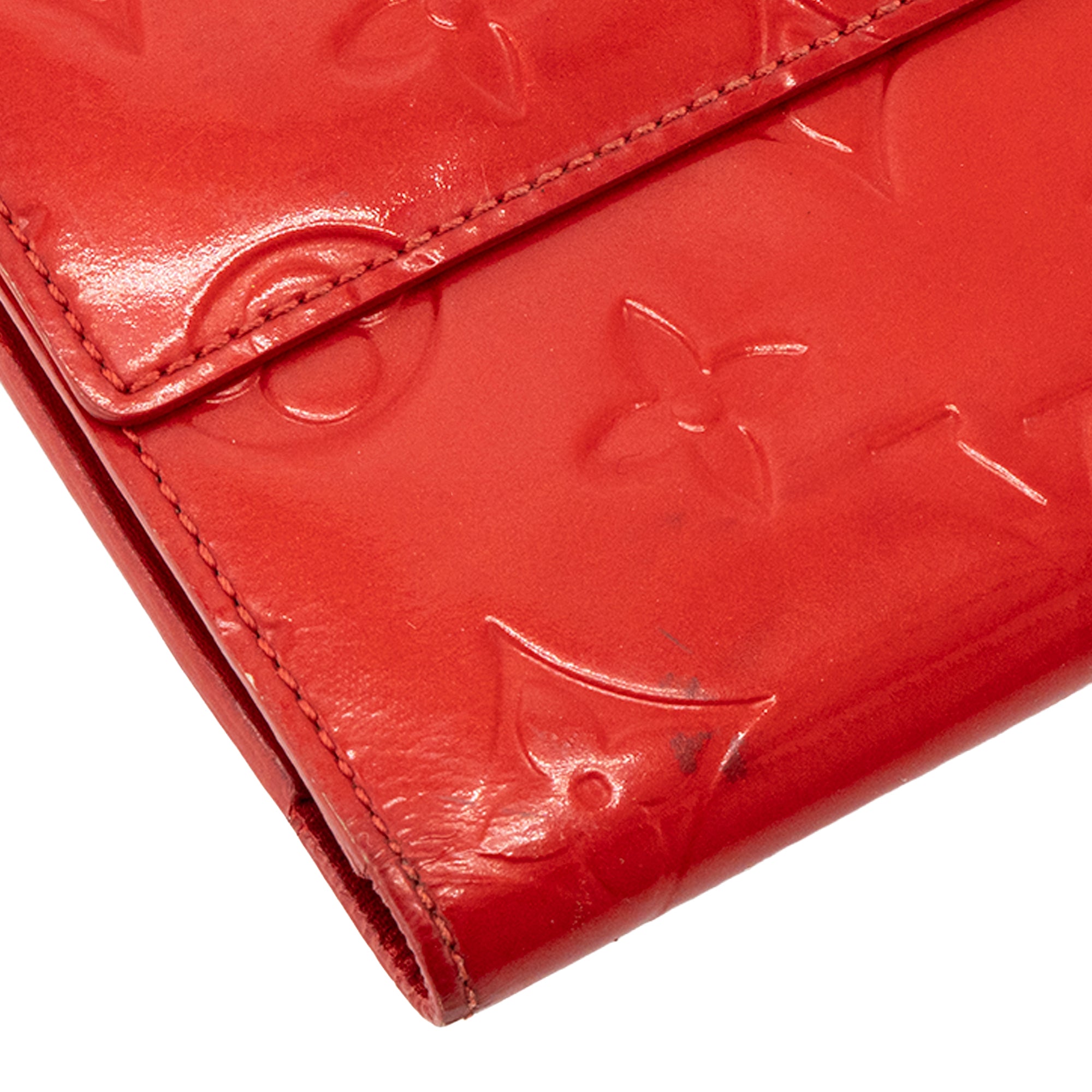LOUIS VUITTON - Portefeuille Sarah Louis Vuitton en cuir empreinte verni rouge vintage