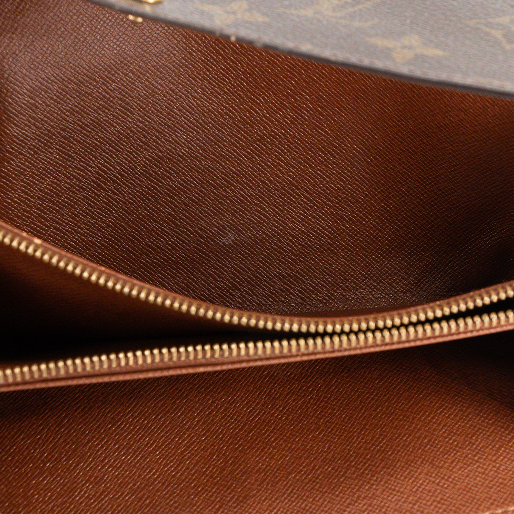LOUIS VUITTON - Portefeuille Sarah Louis Vuitton en toile enduite monogrammée vintage