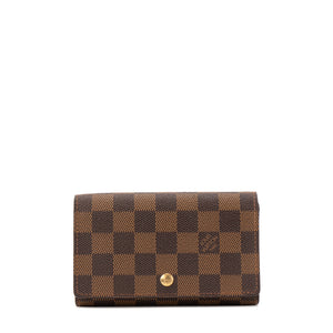 LOUIS VUITTON - Portefeuille Trésor Louis Vuitton en toile damier ébène