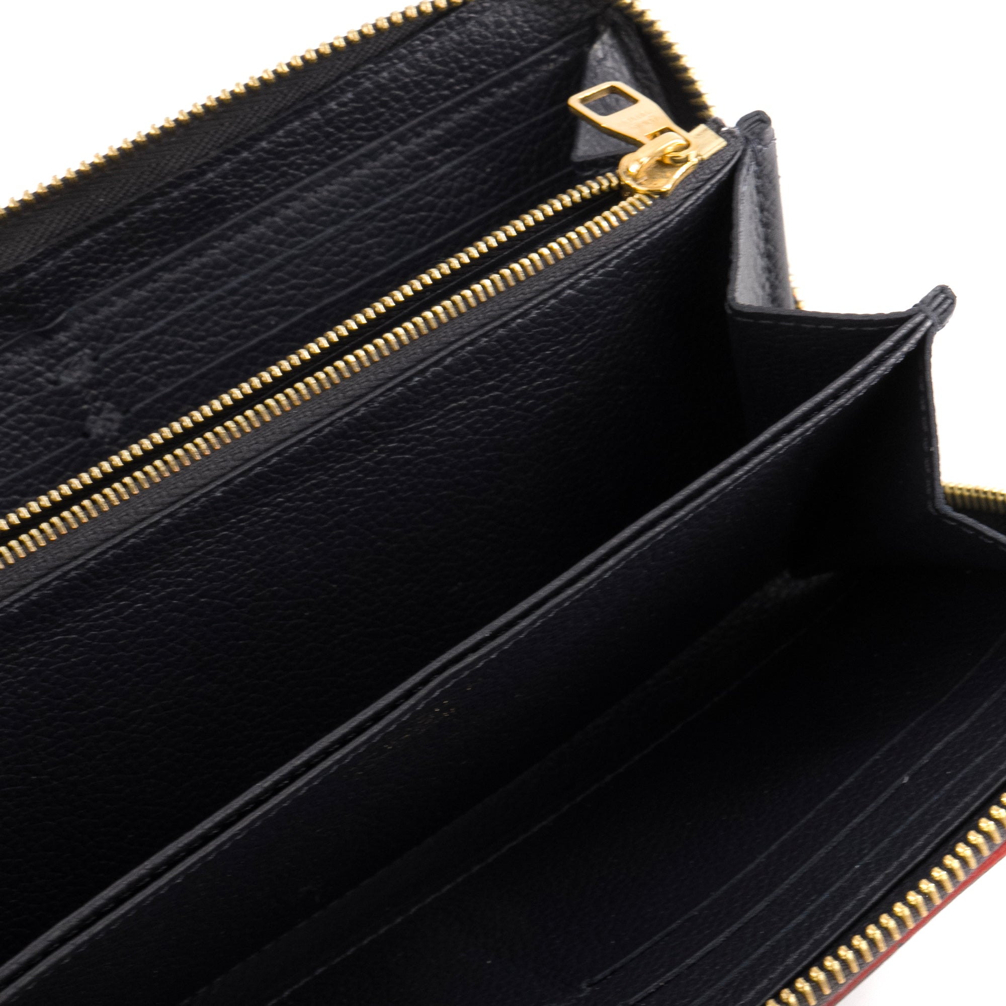 LOUIS VUITTON - Portefeuille Zippy Louis Vuitton en cuir empreinte bleu marine