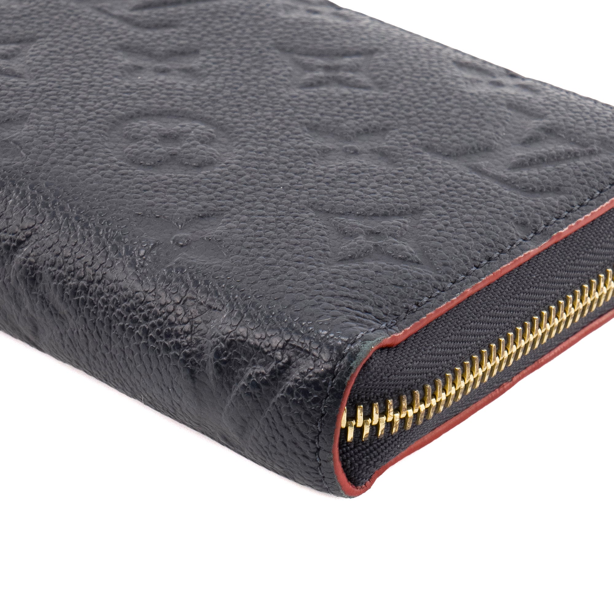 LOUIS VUITTON - Portefeuille Zippy Louis Vuitton en cuir empreinte bleu marine