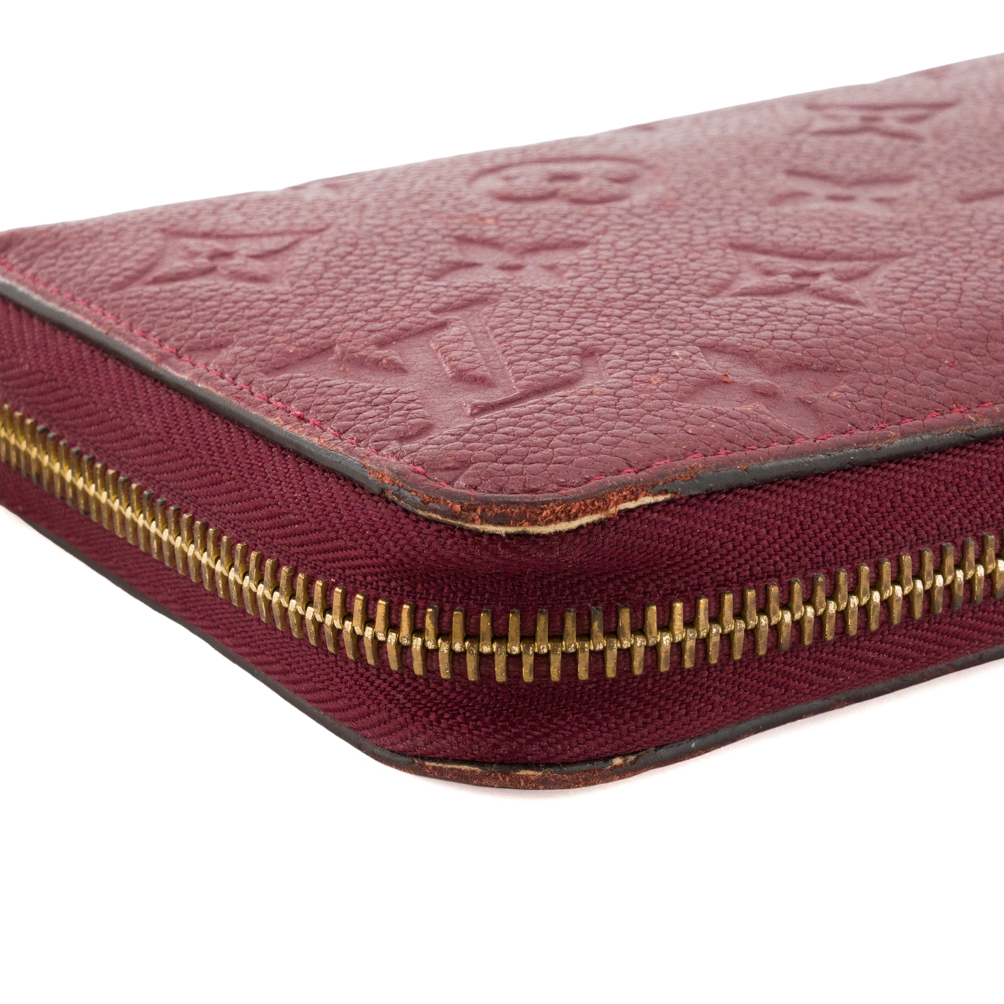LOUIS VUITTON - Portefeuille Zippy Louis Vuitton en cuir empreinte bordeaux