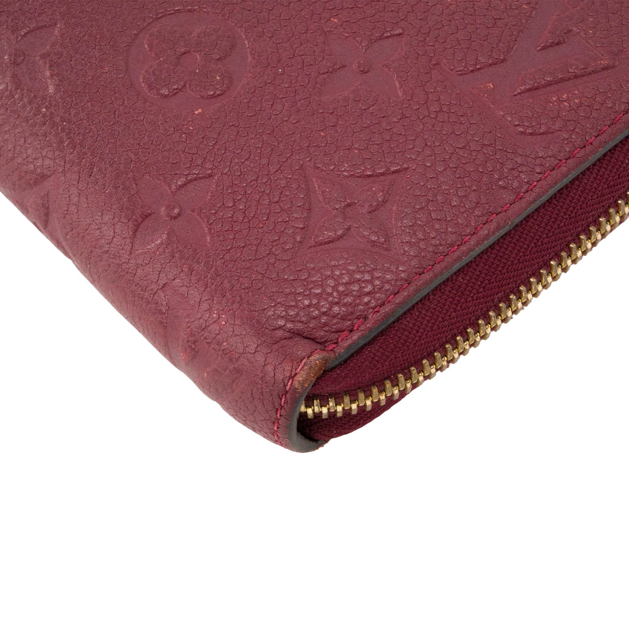 LOUIS VUITTON - Portefeuille Zippy Louis Vuitton en cuir empreinte bordeaux