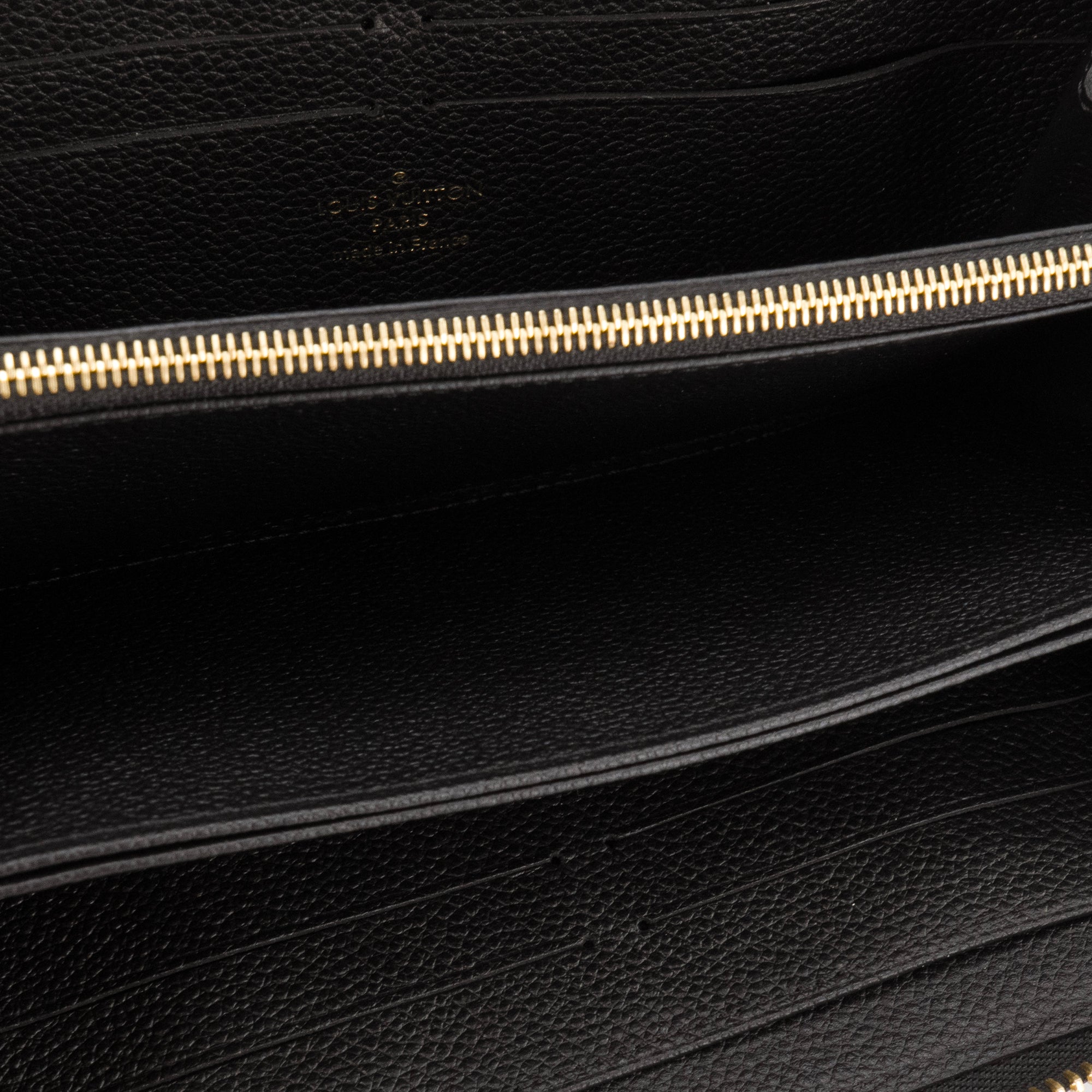 LOUIS VUITTON - Portefeuille Zippy Louis Vuitton en cuir empreinte noir