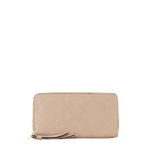 LOUIS VUITTON - Portefeuille Zippy Louis Vuitton en cuir empreinte taupe