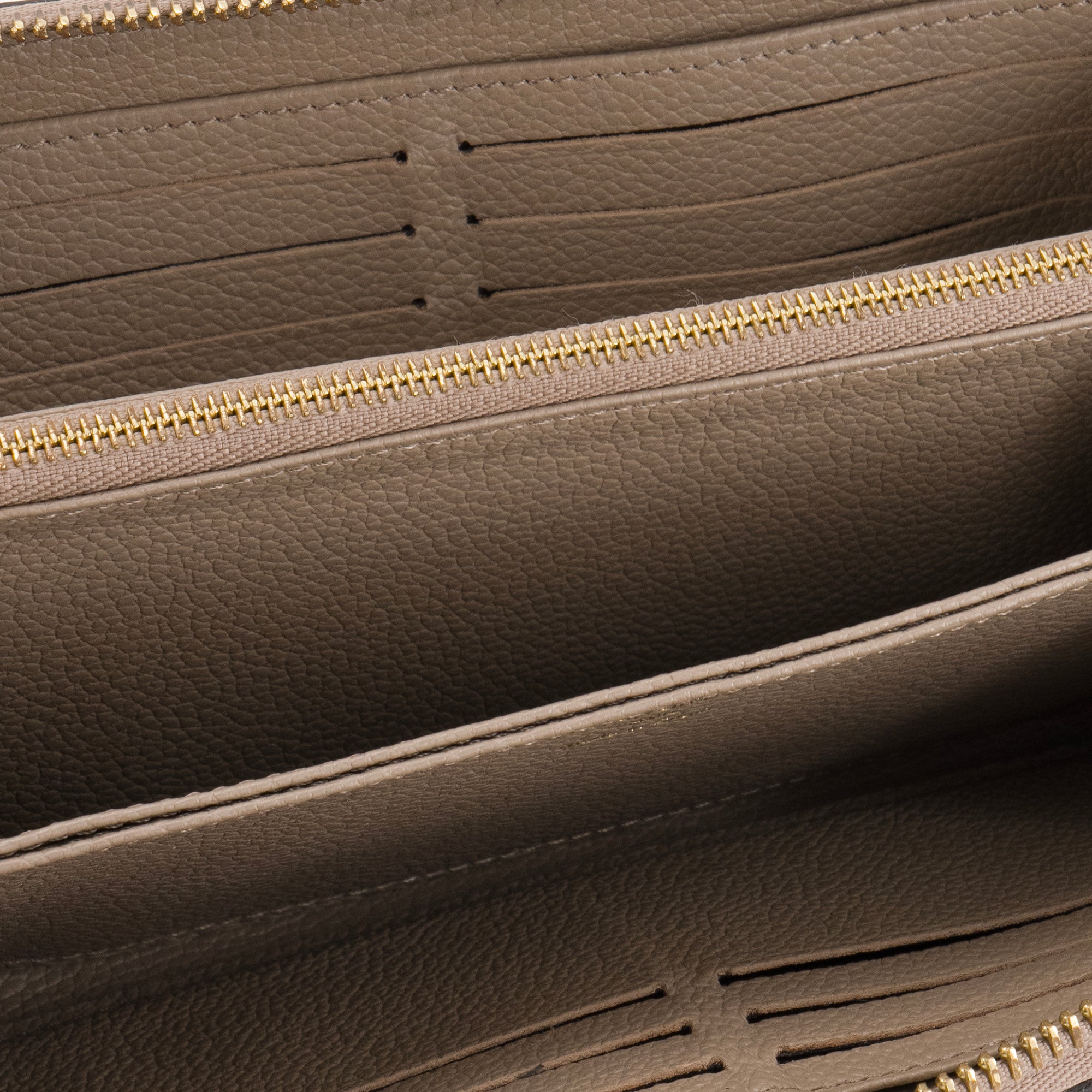 LOUIS VUITTON - Portefeuille Zippy Louis Vuitton en cuir empreinte taupe