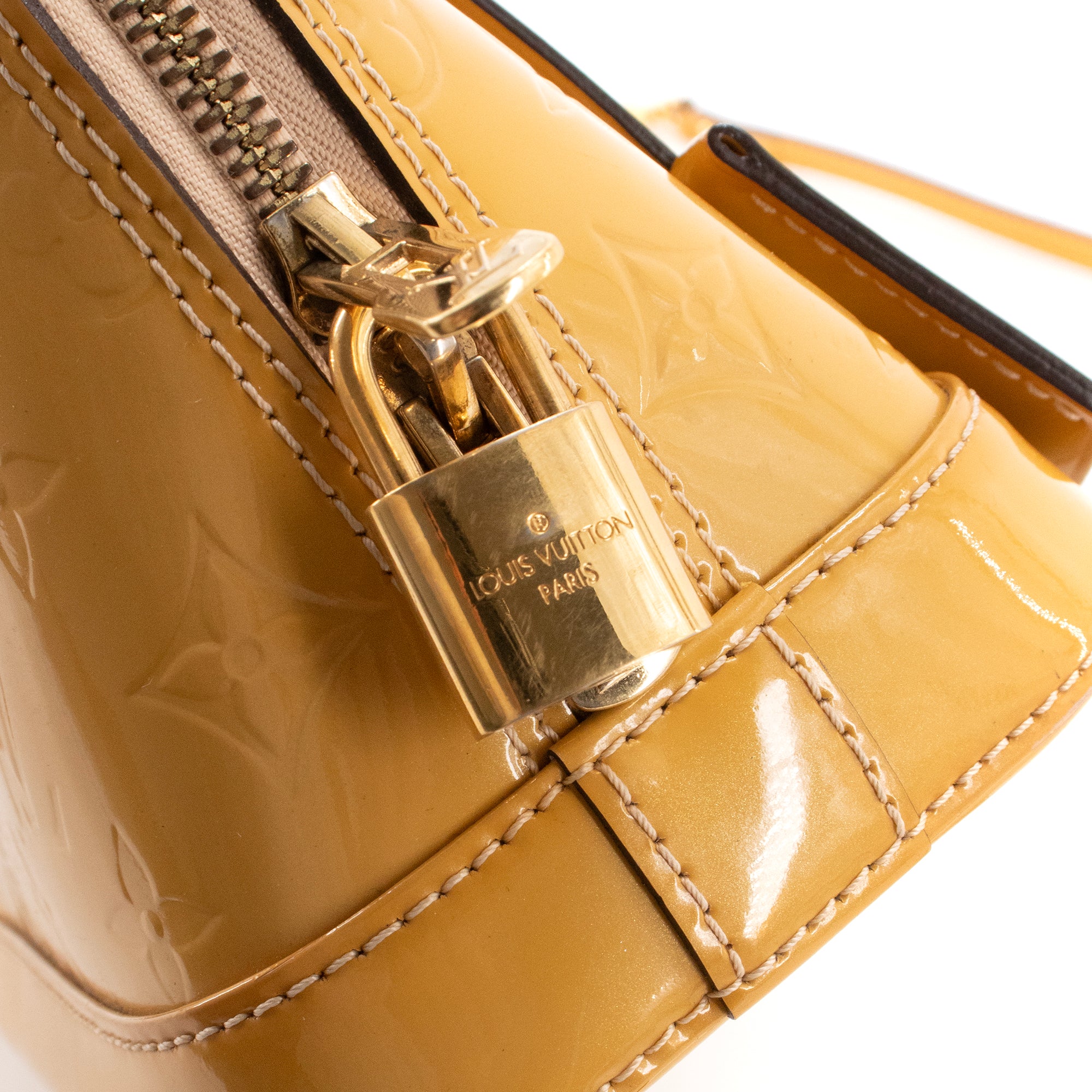 LOUIS VUITTON - Louis Vuitton Alma BB shoulder bag in mustard yellow patent leather