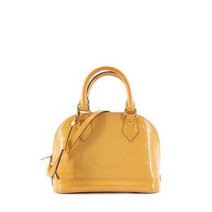 LOUIS VUITTON - Sac à bandoulière Alma BB Louis Vuitton en cuir verni jaune moutarde