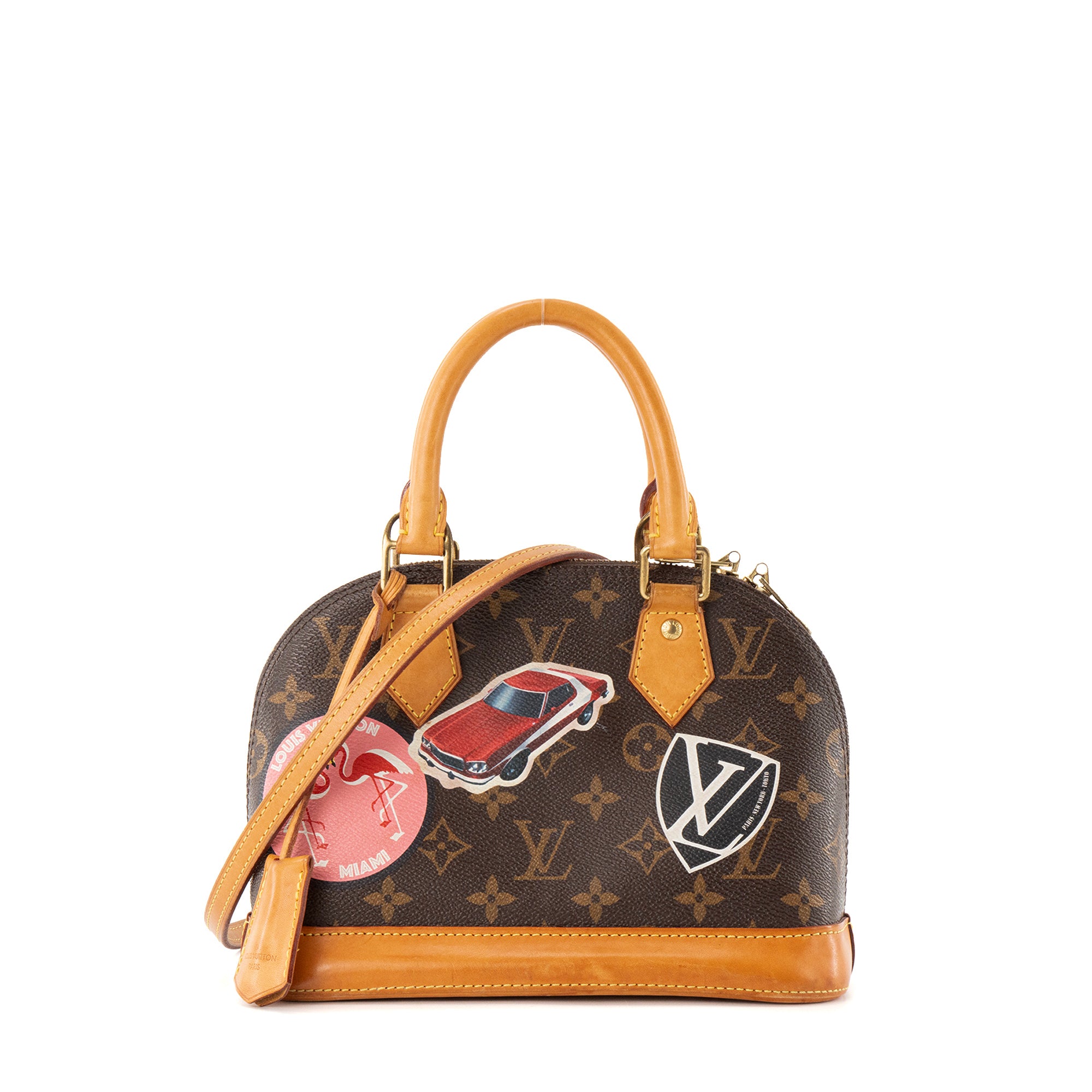 LOUIS VUITTON - Sac à bandoulière Alma BB World Tour Louis Vuitton en toile enduite monogrammée