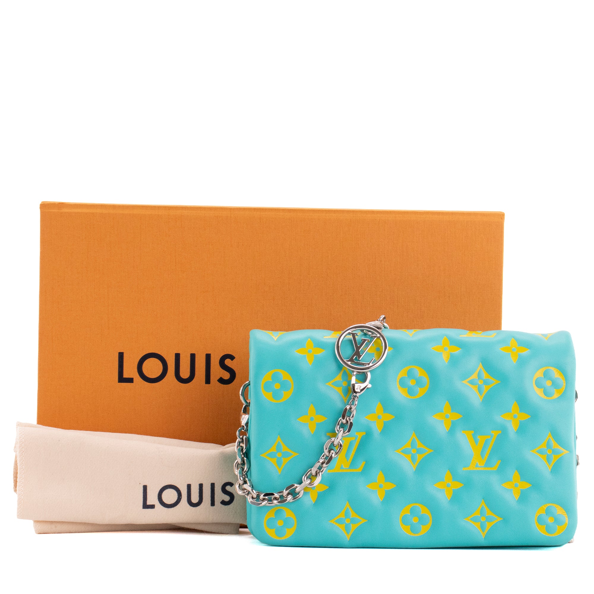 LOUIS VUITTON - Sac à bandoulière Coussin Louis Vuitton en cuir bleu et jaune