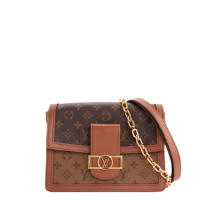 LOUIS VUITTON - Sac à bandoulière Dauphine MM Louis Vuitton en toile enduite monogrammée et cuir