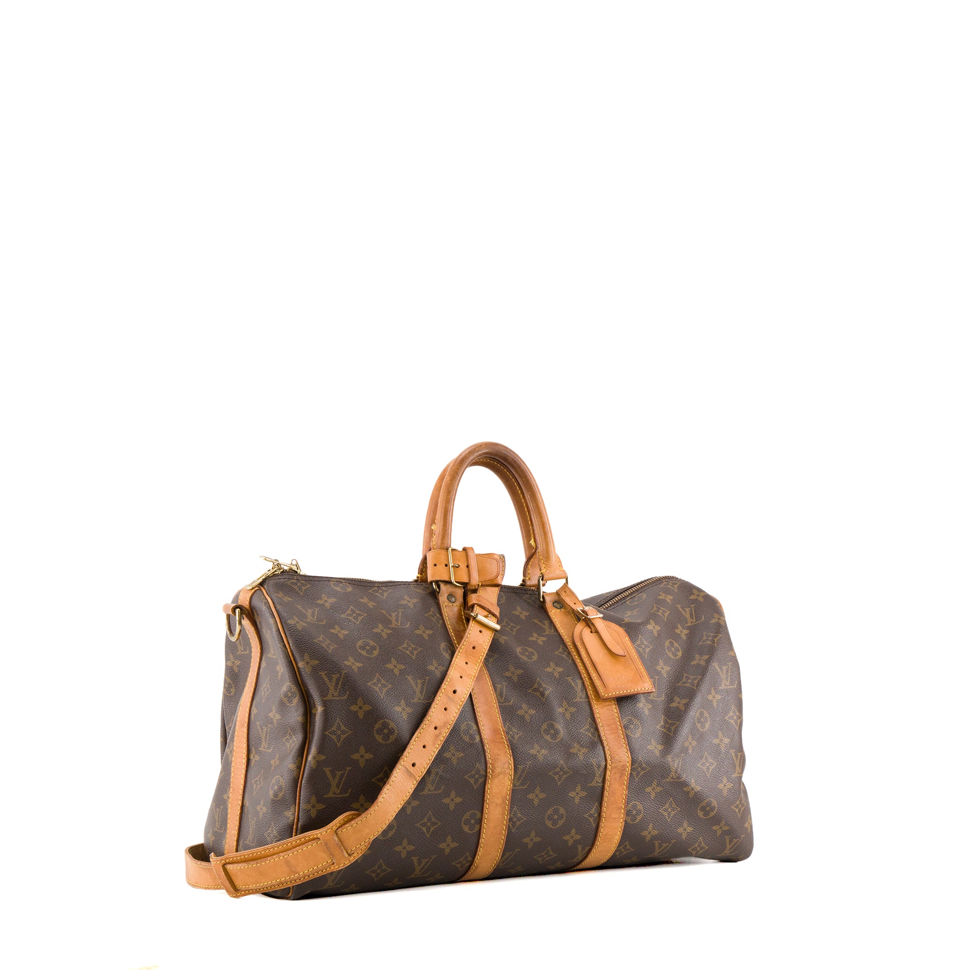 LOUIS VUITTON - Sac à bandoulière Keepall 45 Louis Vuitton en toile enduite monogrammée vintage