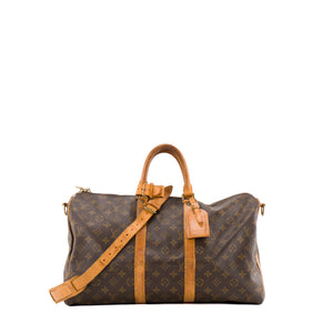 LOUIS VUITTON - Sac à bandoulière Keepall 45 Louis Vuitton en toile enduite monogrammée vintage