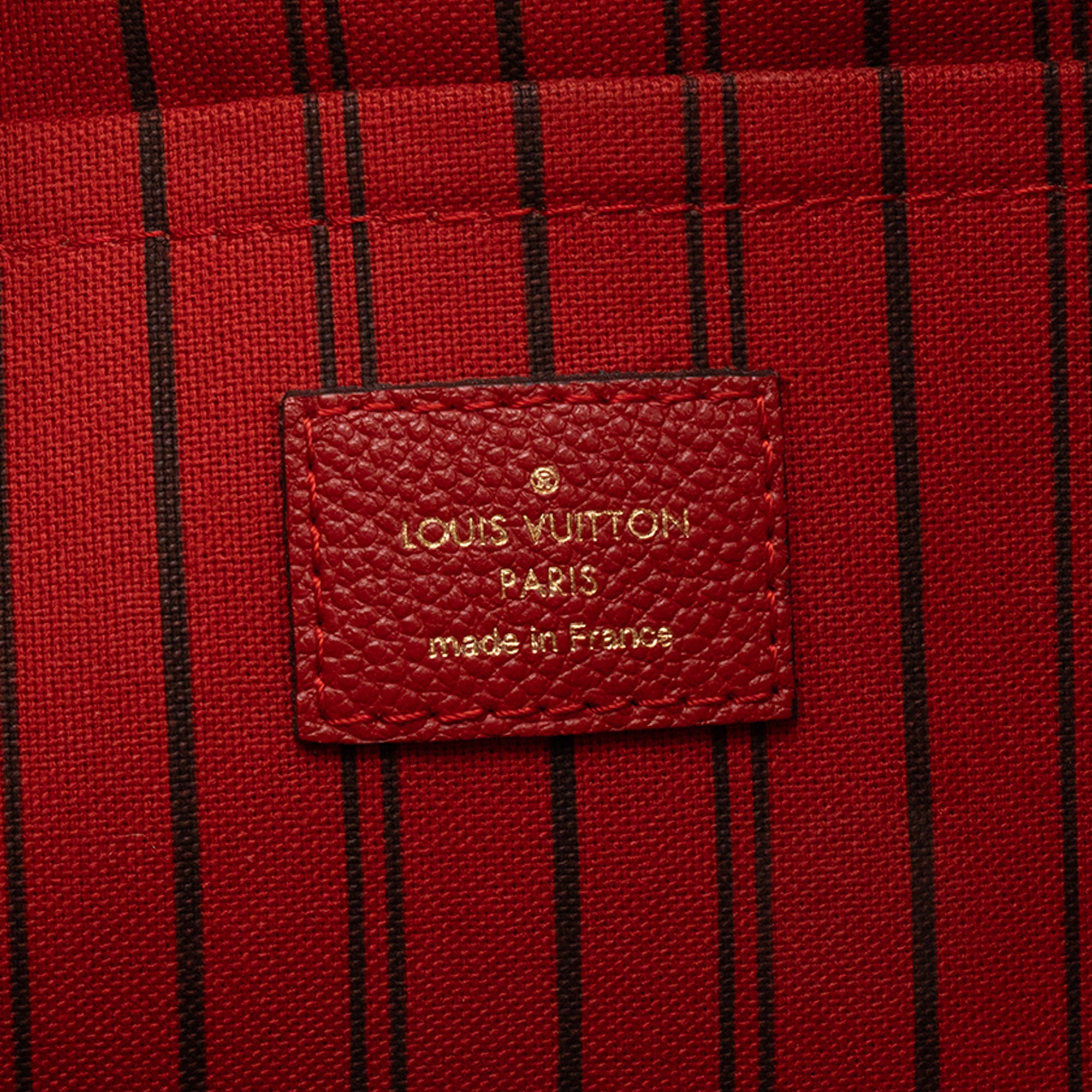 LOUIS VUITTON - Sac à bandoulière Mazarine Louis Vuitton en cuir empreinte rouge