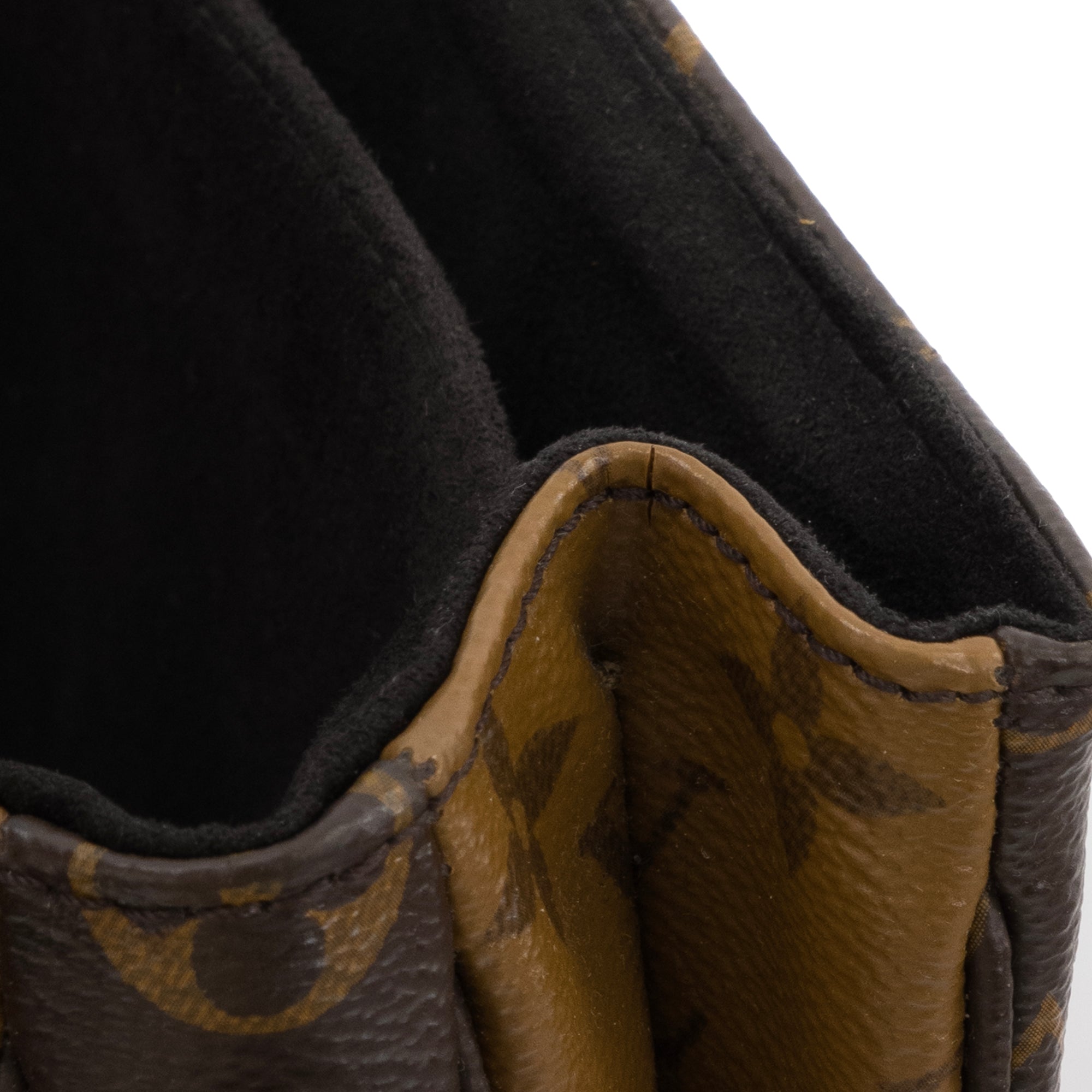 LOUIS VUITTON - Sac à bandoulière Métis Louis Vuitton en toile enduite monogrammée reverse