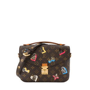 LOUIS VUITTON - Sac à bandoulière Métis Love Lock Louis Vuitton en toile enduite monogrammée édition limitée