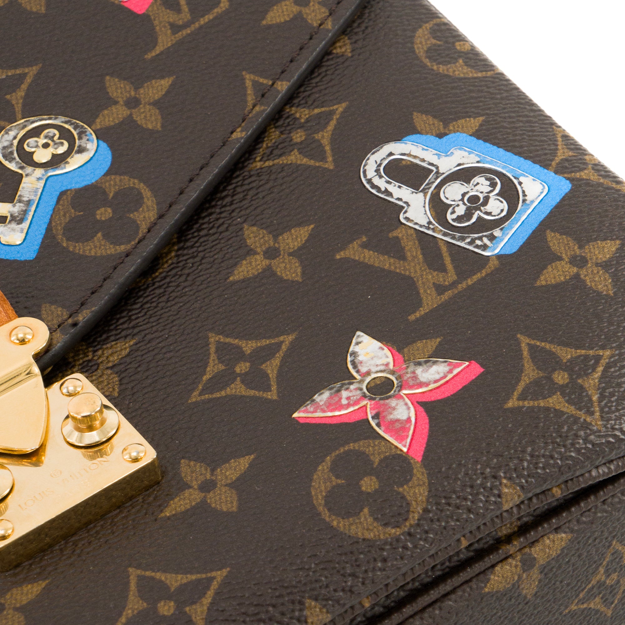 LOUIS VUITTON - Sac à bandoulière Métis Love Lock Louis Vuitton en toile enduite monogrammée édition limitée