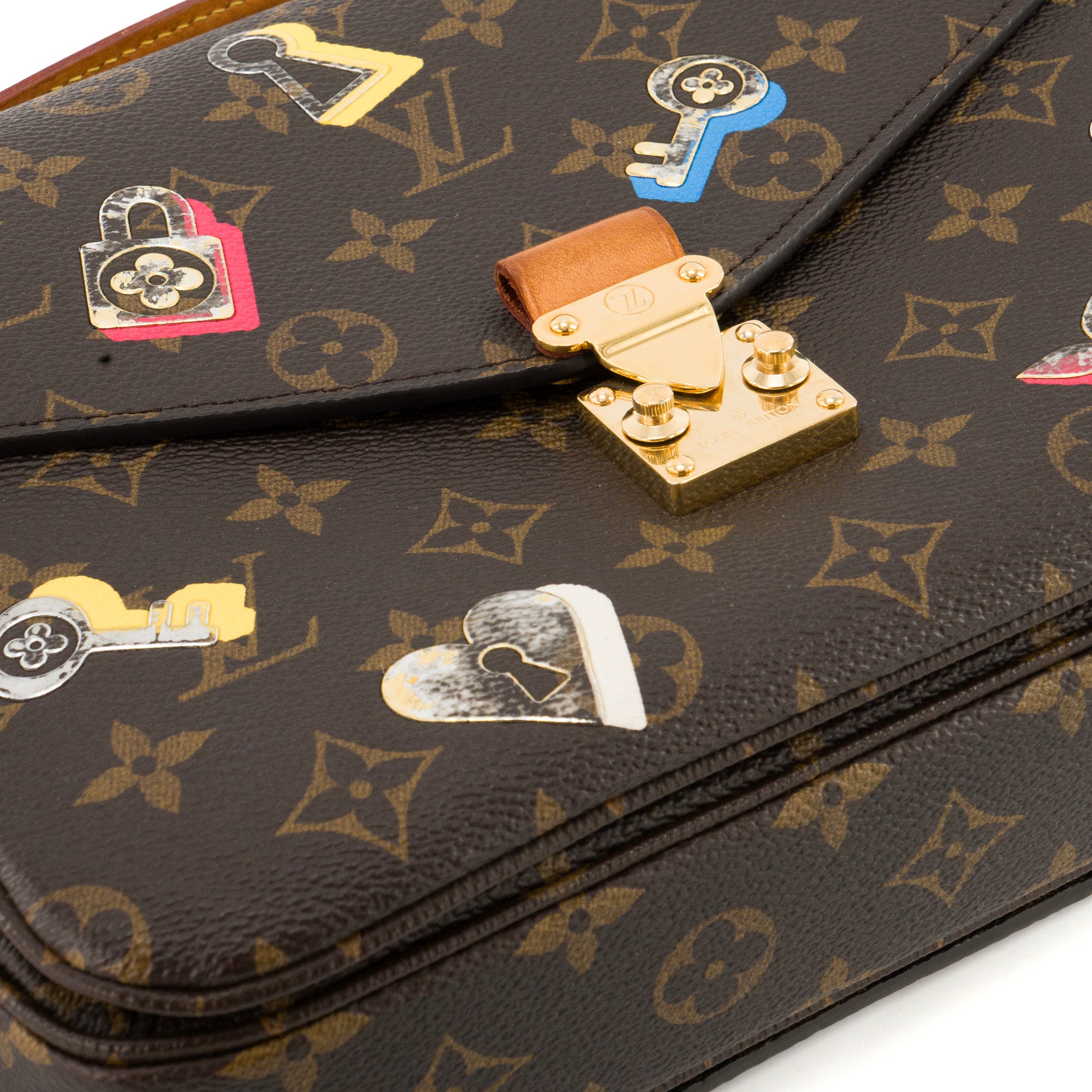 LOUIS VUITTON - Sac à bandoulière Métis Love Lock Louis Vuitton en toile enduite monogrammée édition limitée