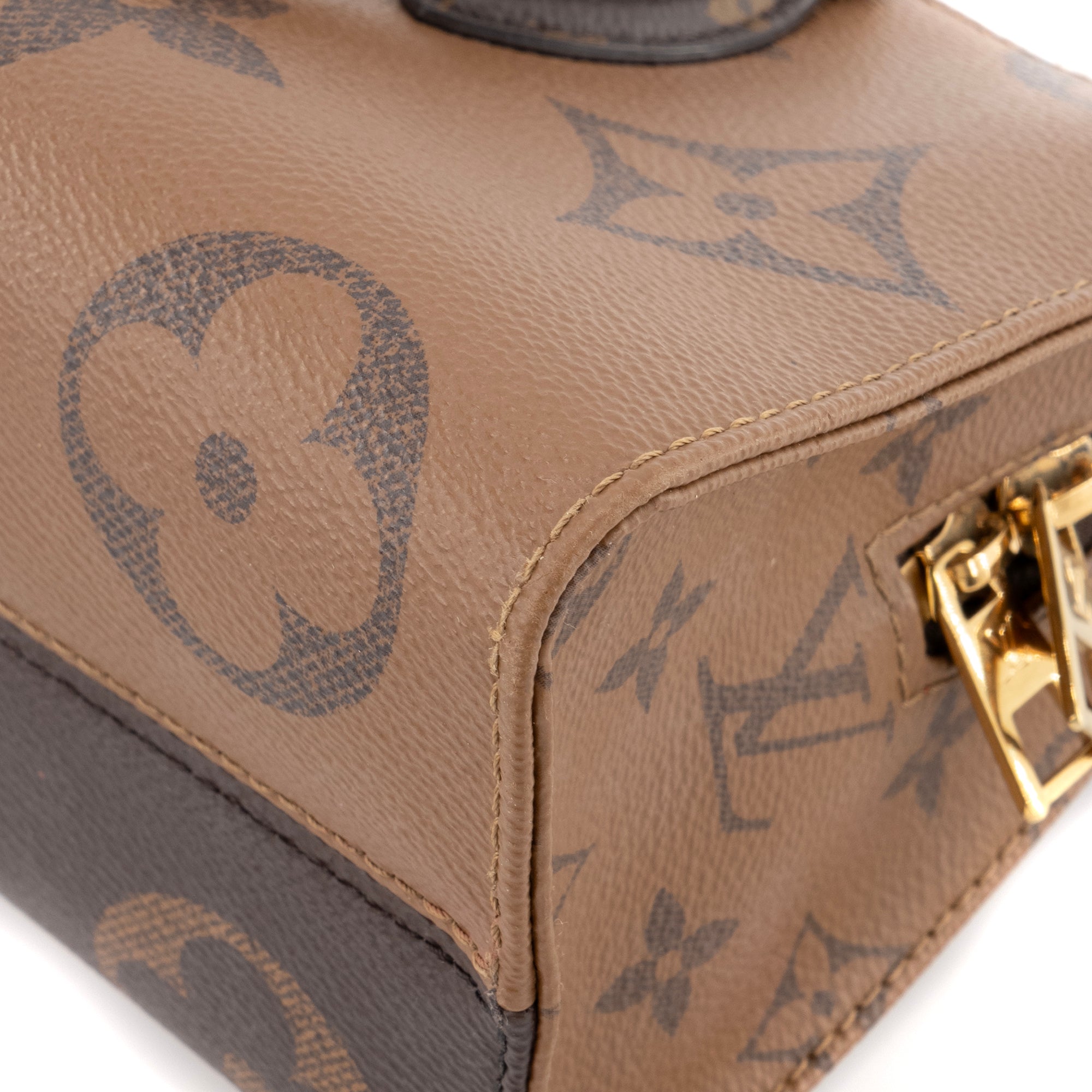 LOUIS VUITTON - Sac à bandoulière Onthego East West Louis Vuitton en toile enduite monogrammée