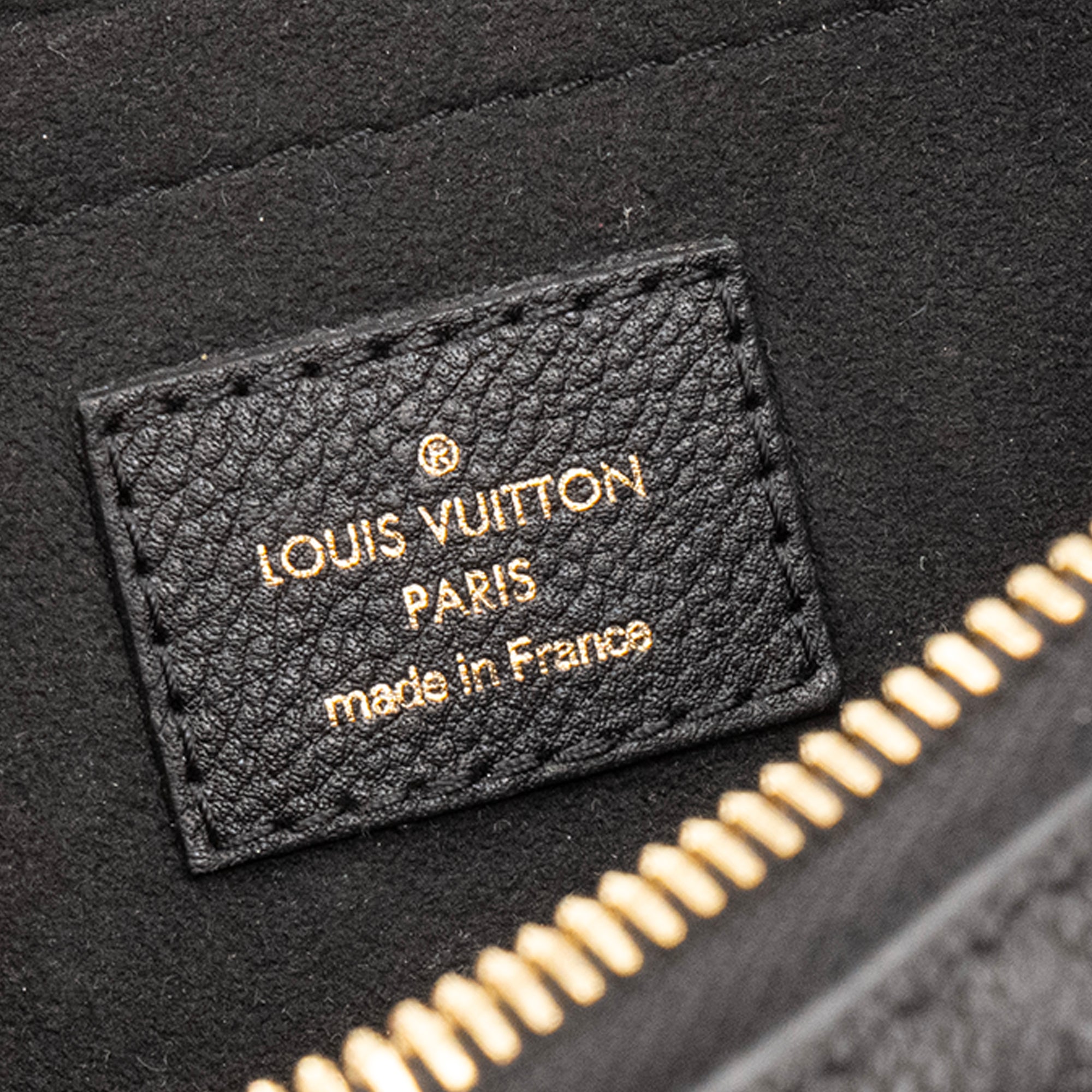 LOUIS VUITTON - Sac à bandoulière Speedy 20 Louis Vuitton en cuir empreinte noir