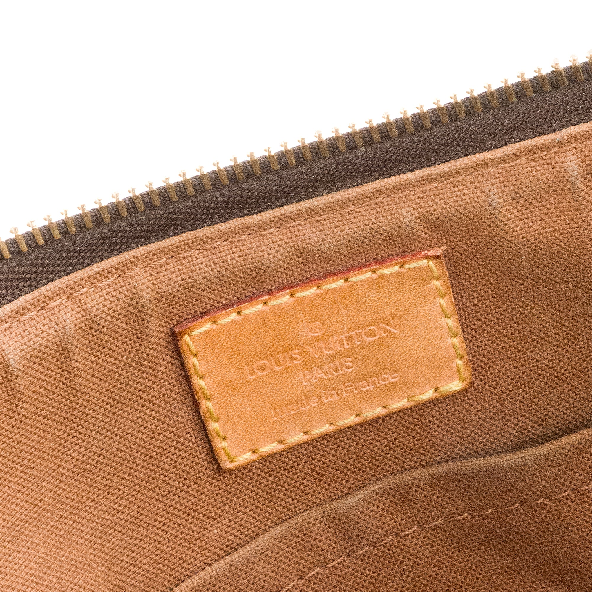 LOUIS VUITTON - Sac à bandoulière Tulum Louis Vuitton en toile enduite monogrammée