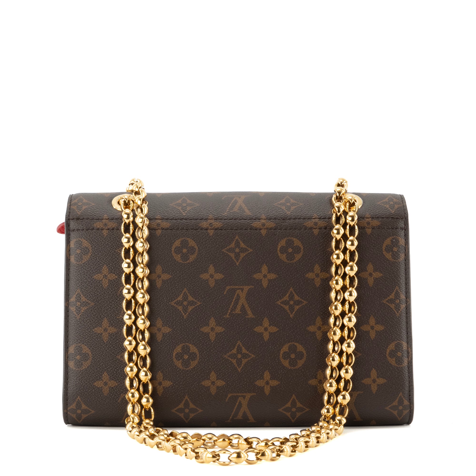 LOUIS VUITTON - Sac à bandoulière Victoire Louis Vuitton en cuir rouge et toile enduite monogrammée