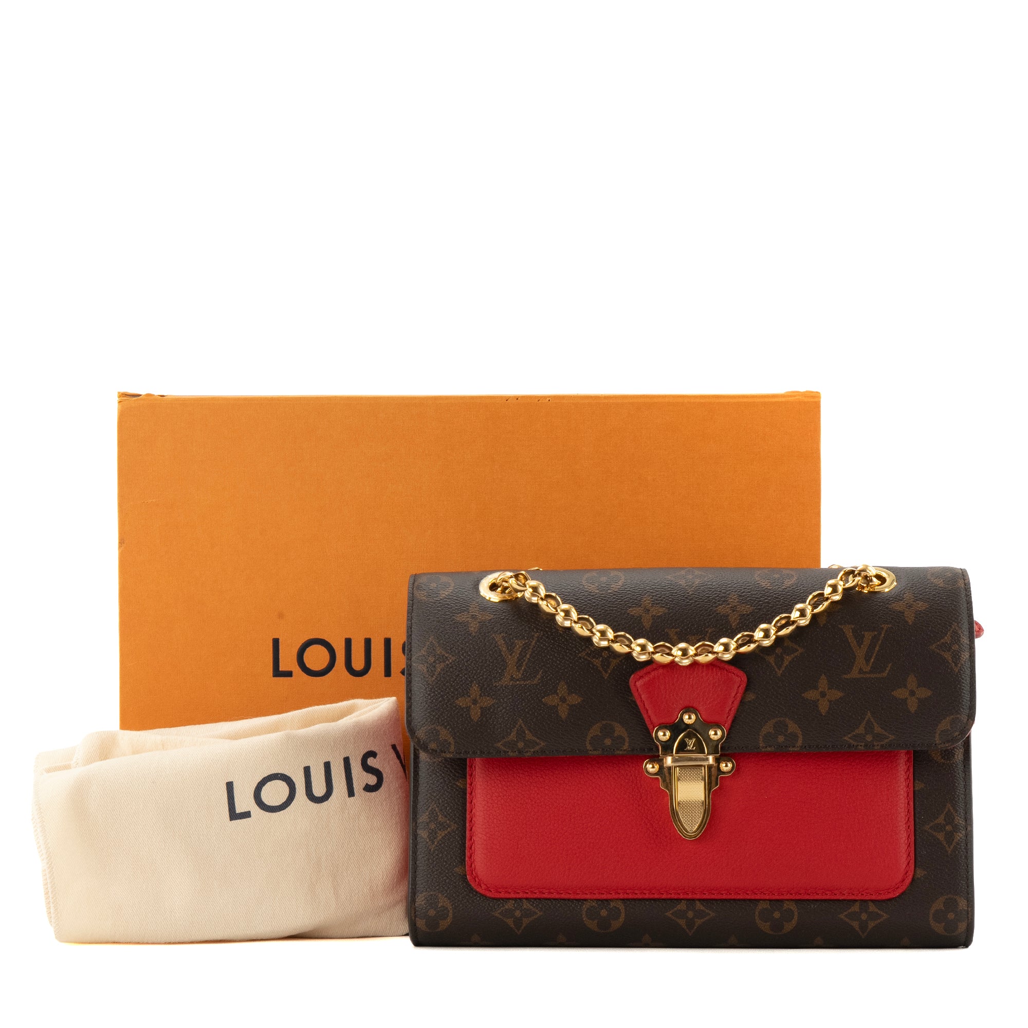 LOUIS VUITTON - Sac à bandoulière Victoire Louis Vuitton en cuir rouge et toile enduite monogrammée