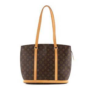 LOUIS VUITTON - Sac à épaule Babylone Louis Vuitton en toile enduite monogrammee vintage