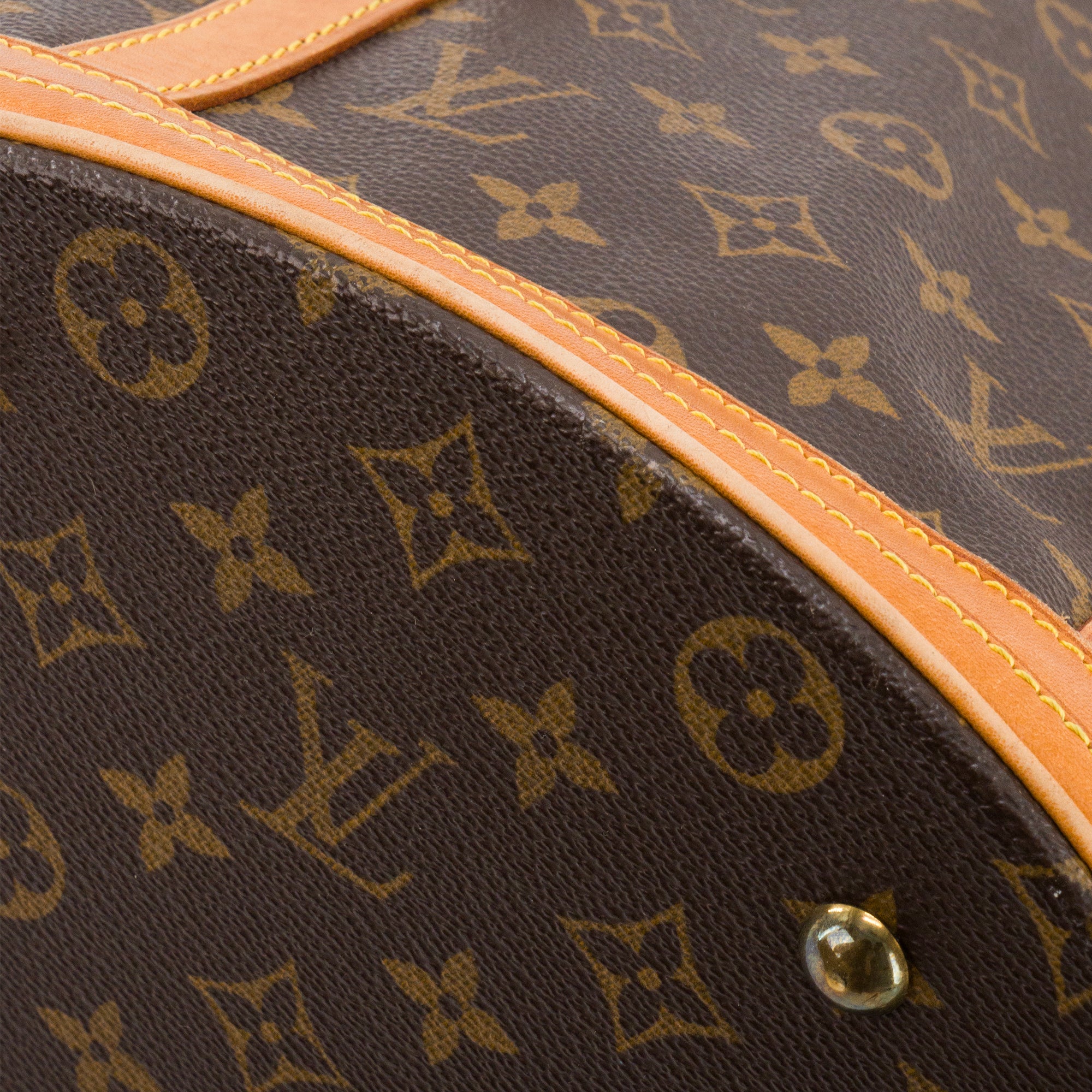 LOUIS VUITTON - Sac à épaule Bucket Louis Vuitton en toile enduite monogrammée vintage