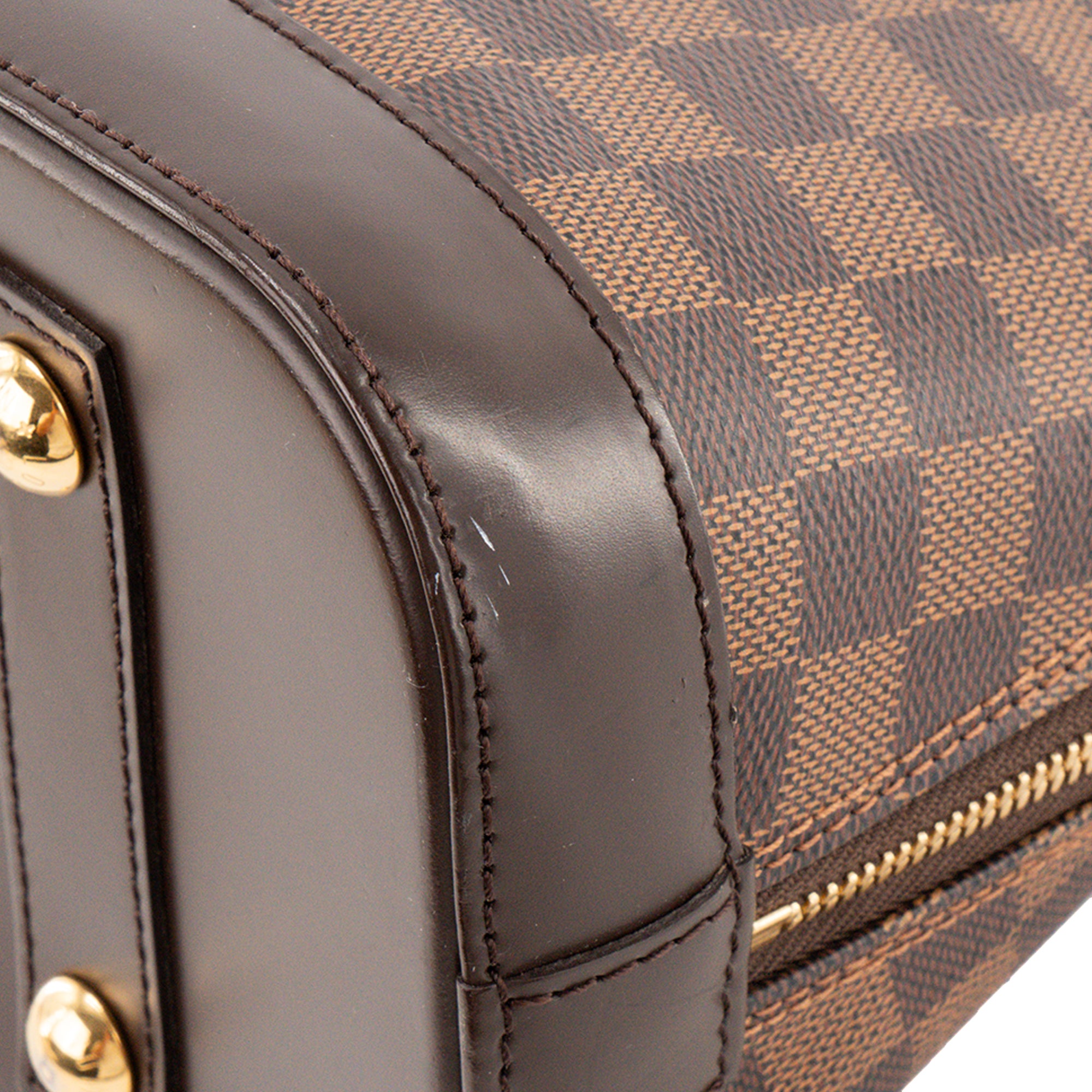 LOUIS VUITTON - Sac à main Alma PM Louis Vuitton en toile damier ébène