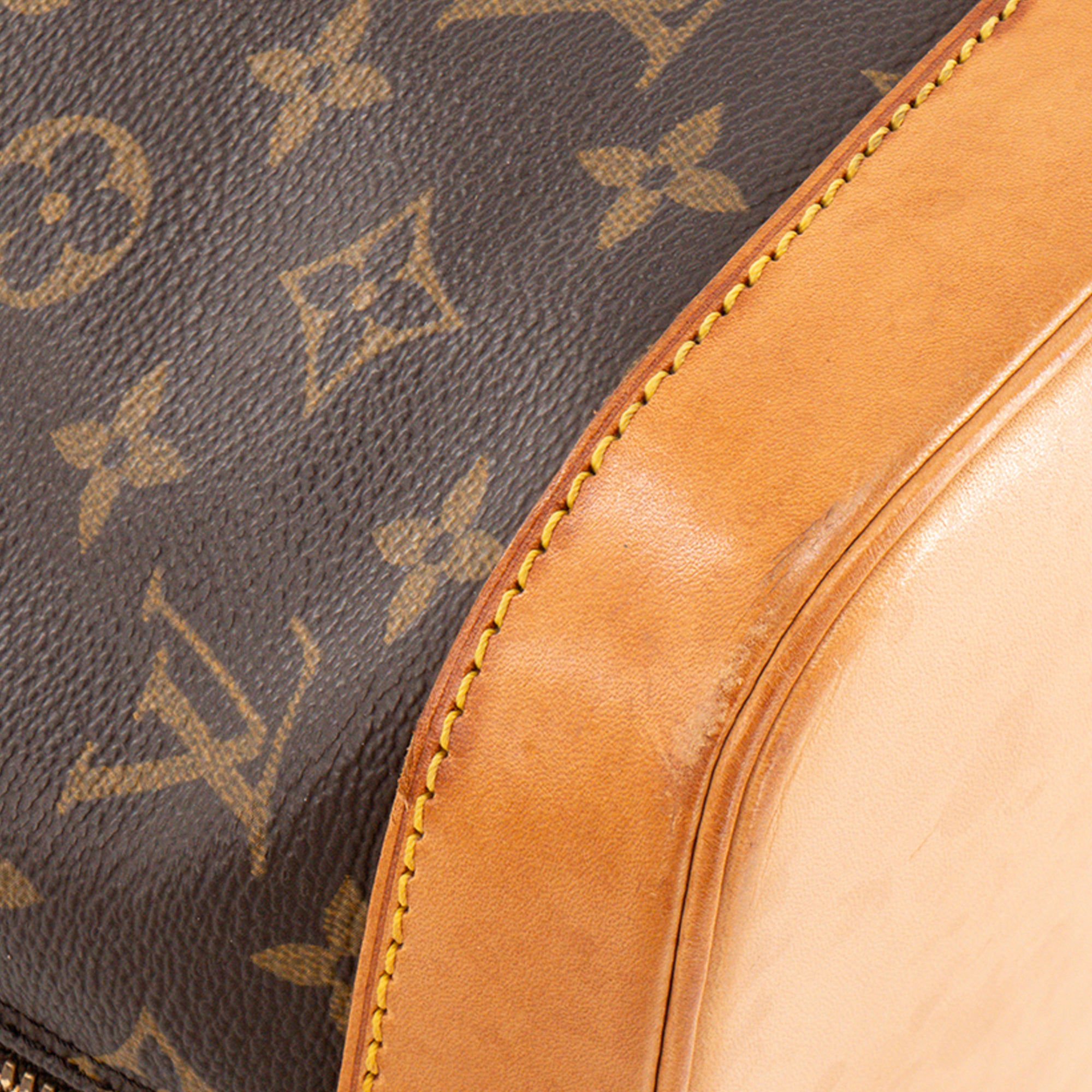 LOUIS VUITTON - Sac à main Alma PM Louis Vuitton en toile enduite monogrammée vintage