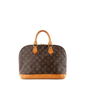 LOUIS VUITTON - Sac à main Alma PM Louis Vuitton en toile enduite monogrammée vintage