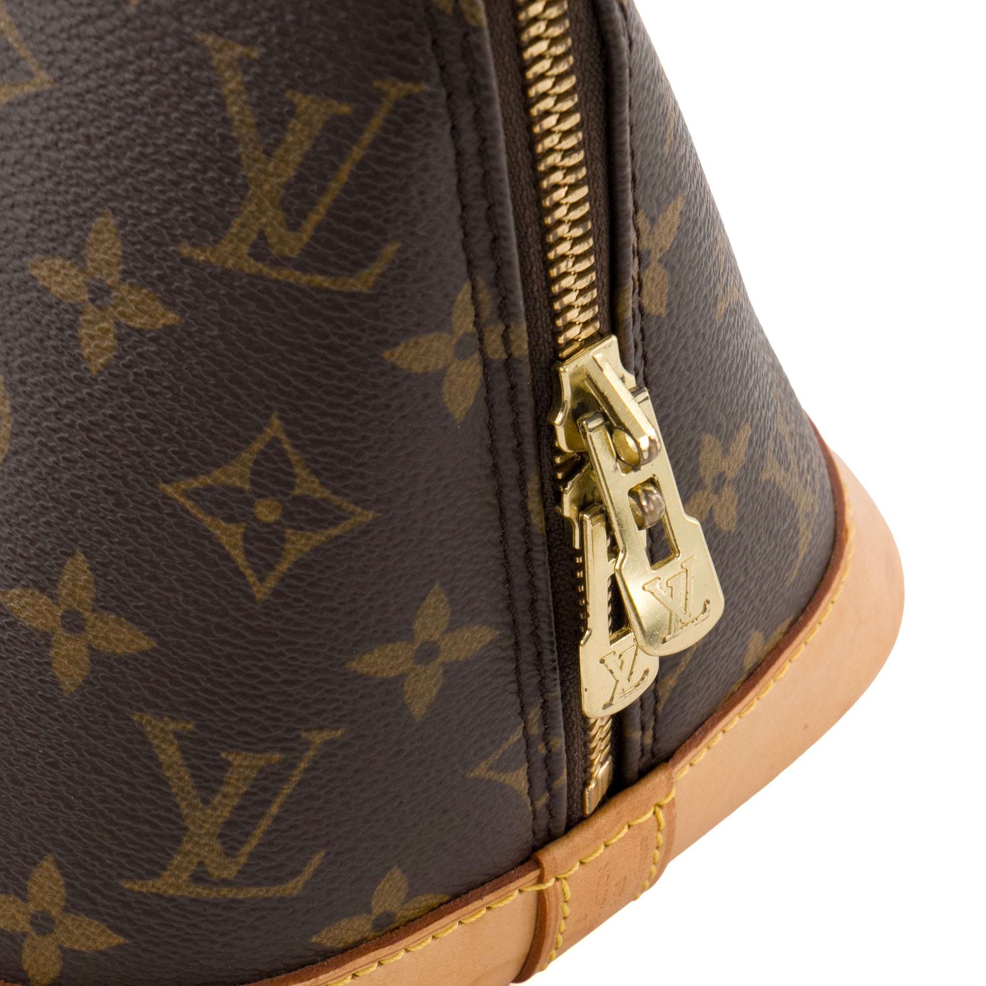 LOUIS VUITTON - Sac à main Alma PM Louis Vuitton en toile enduite monogrammée vintage