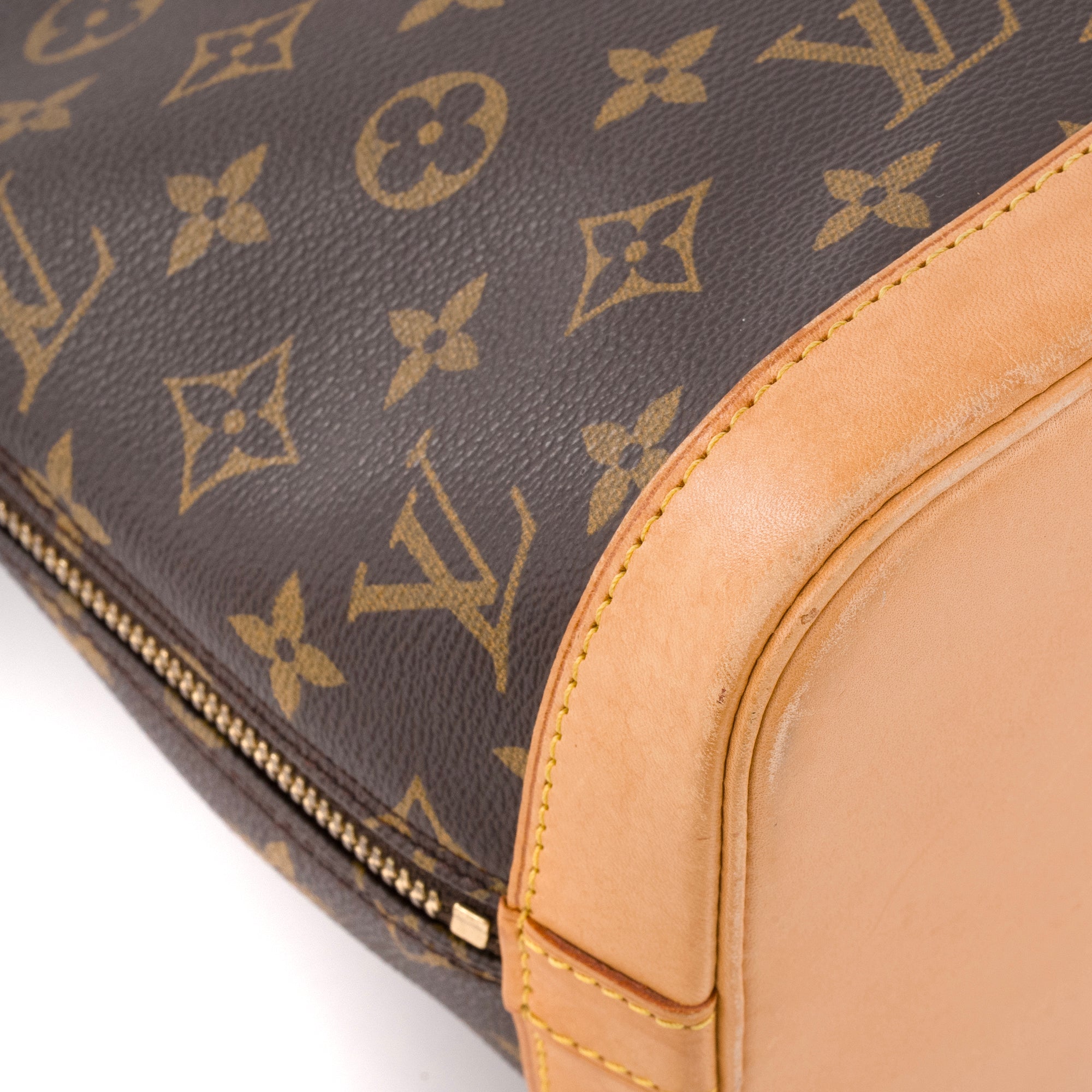 LOUIS VUITTON - Sac à main Alma PM Louis Vuitton en toile enduite monogrammée vintage