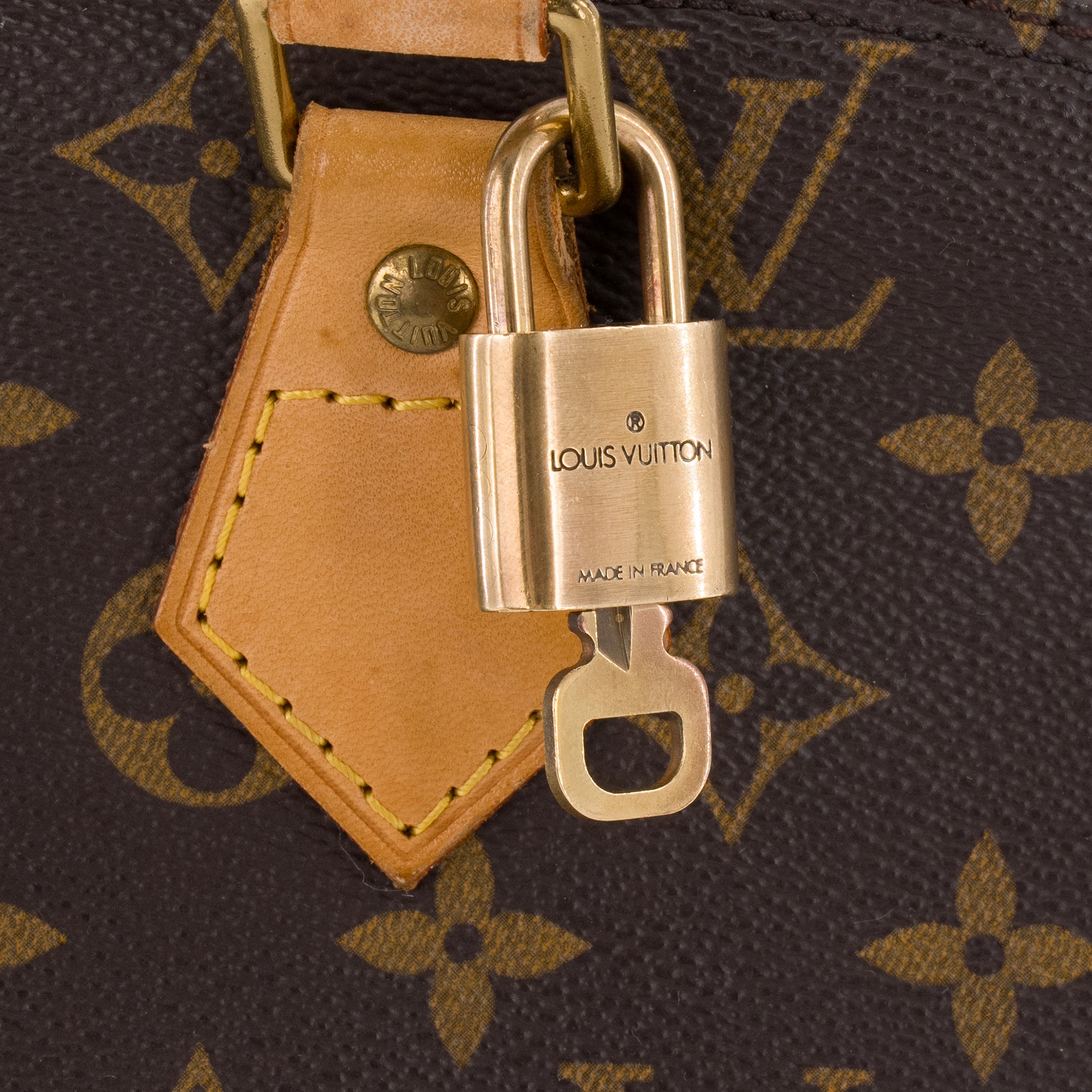 LOUIS VUITTON - Sac à main Alma PM Louis Vuitton en toile enduite monogrammée vintage