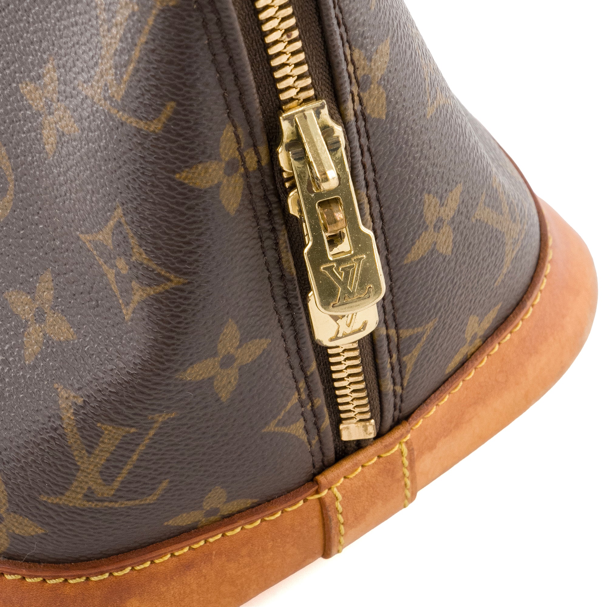 LOUIS VUITTON - Sac à main Alma PM Louis Vuitton en toile enduite monogrammée vintage