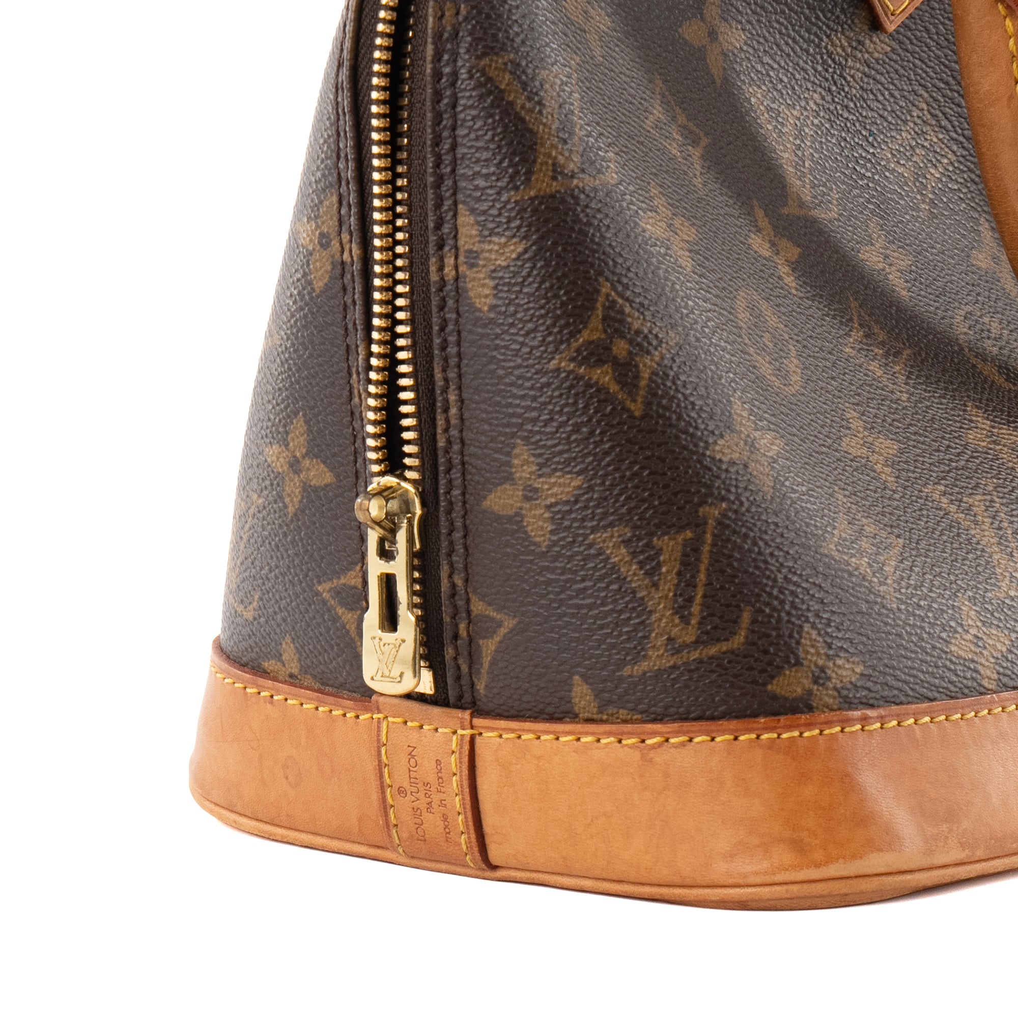 LOUIS VUITTON - Sac à main Alma PM Louis Vuitton en toile enduite monogrammée vintage