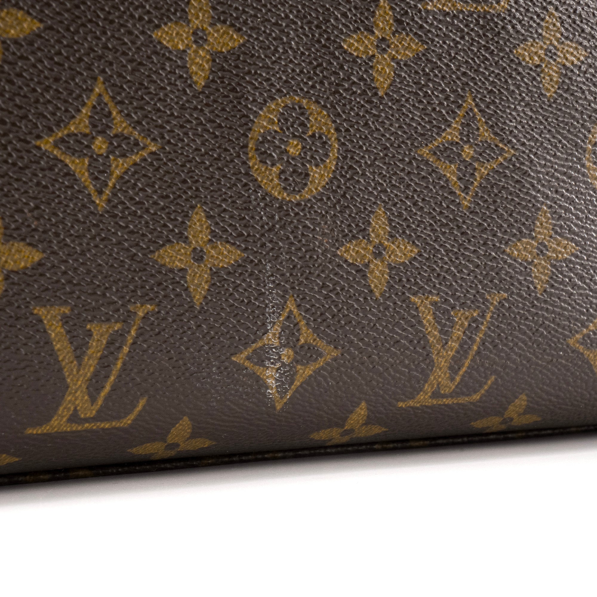 LOUIS VUITTON - Sac à main Rivoli Louis Vuitton en toile enduite monogrammée vintage