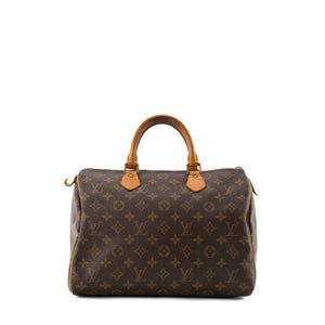 LOUIS VUITTON - Sac à main Speedy 30 Louis Vuitton en toile enduite monogrammée marron vintage