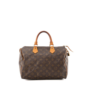 LOUIS VUITTON - Sac à main Speedy 30 Louis Vuitton en toile enduite monogrammée vintage