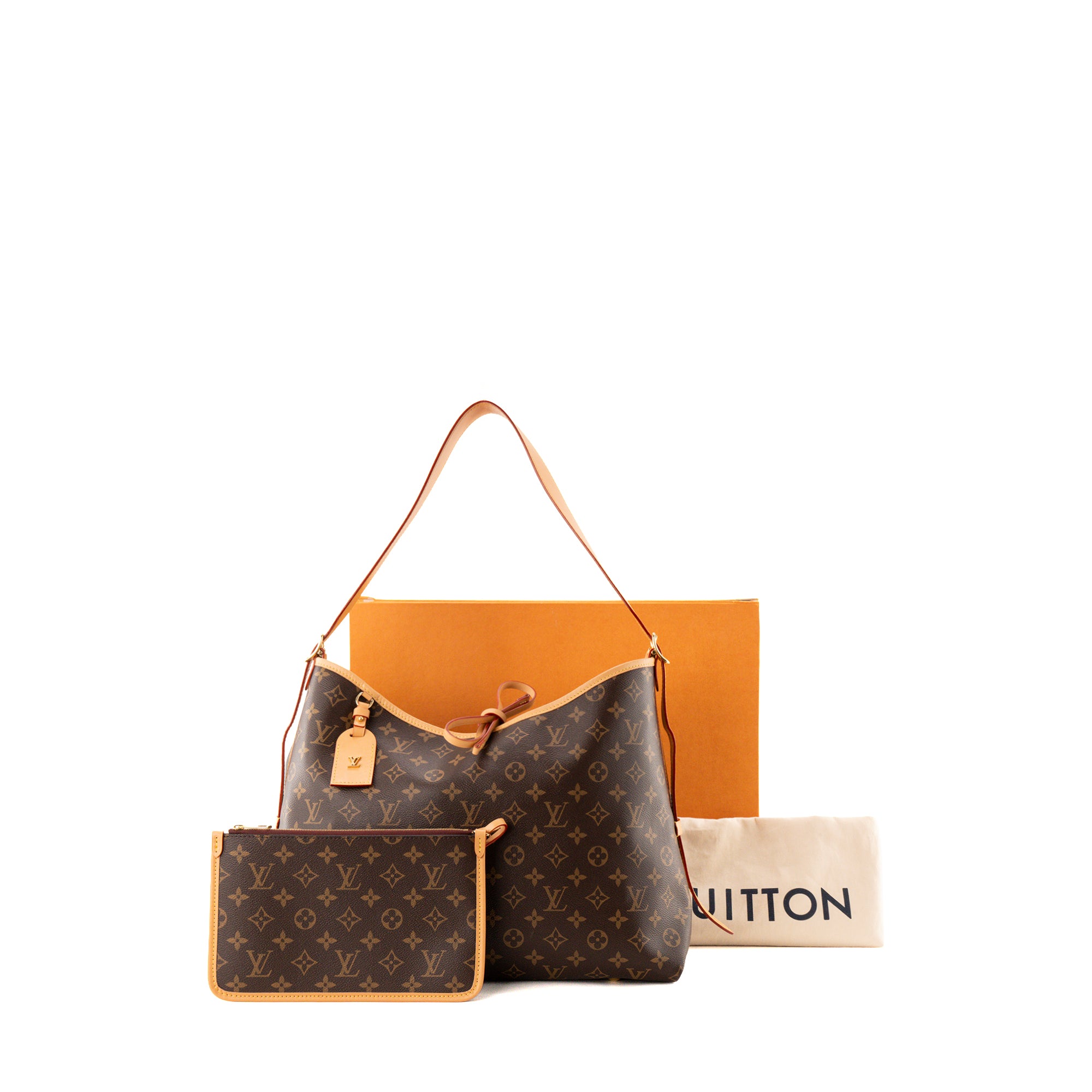 LOUIS VUITTON - Sac cabas CarryAll MM Louis Vuitton en toile enduite monogrammée