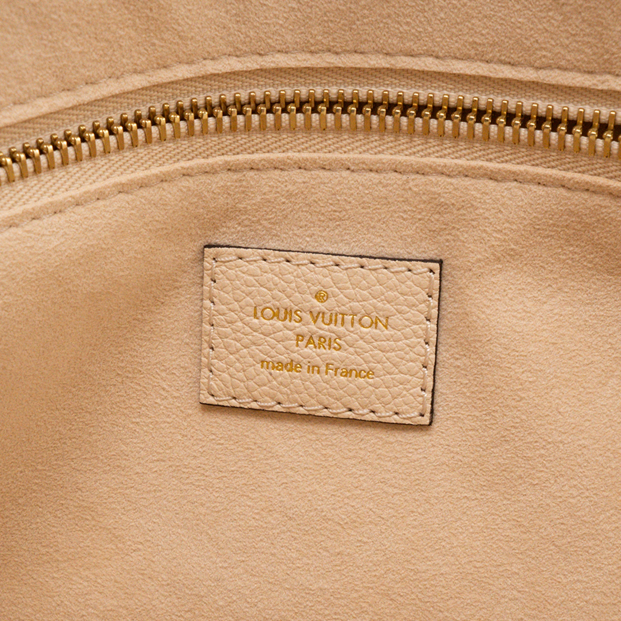 LOUIS VUITTON - Sac Cabas Neverfull MM Louis Vuitton en cuir empreinte beige
